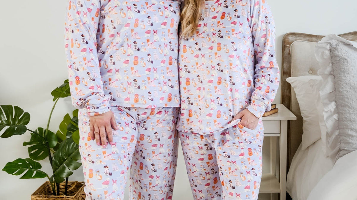 Miranda Nic purple velour Catwalk Kitties cat print pajama set on model — Cloud Nine Pajamas Edmonton
