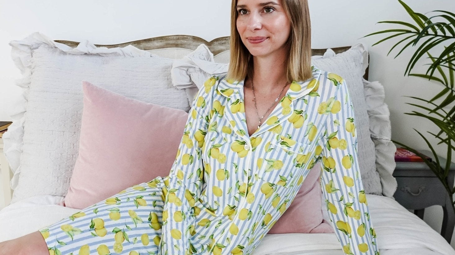 Woman lounging comfortably in Georgia Rylan bamboo pyjamas — Cloud Nine Pajamas Edmonton