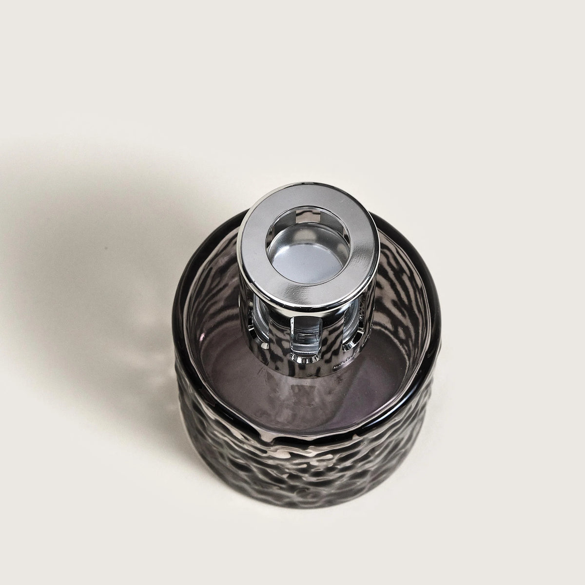 Maison Berger Mirage Black Fragrance Lamp top view matte black silhouette — Cloud Nine Pajamas
