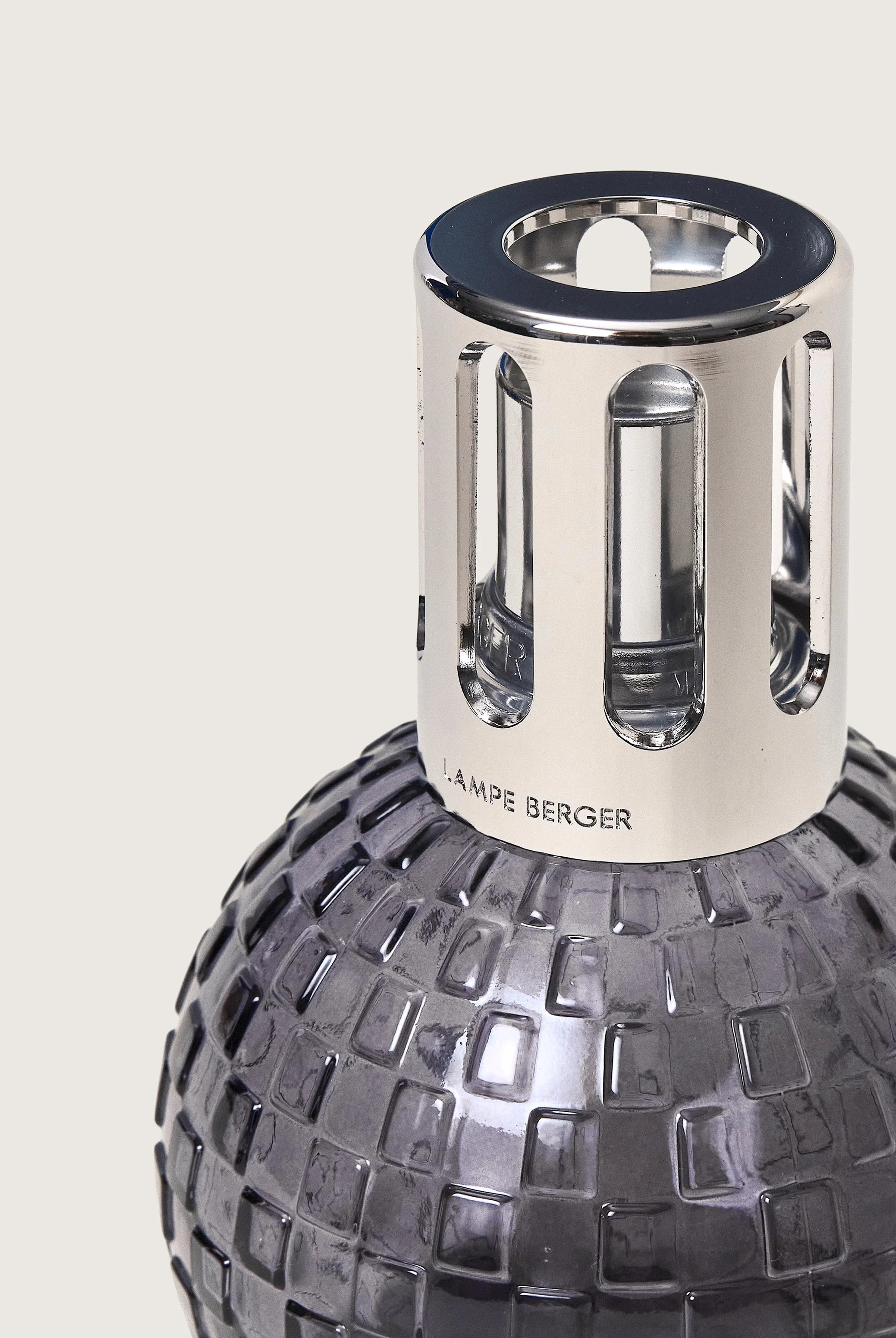 Maison Berger Paris Disco Fragrance Lamp Gift Set in grey with fragrance bottle, ideal for home décor and luxe scent. showing close up of the bottle