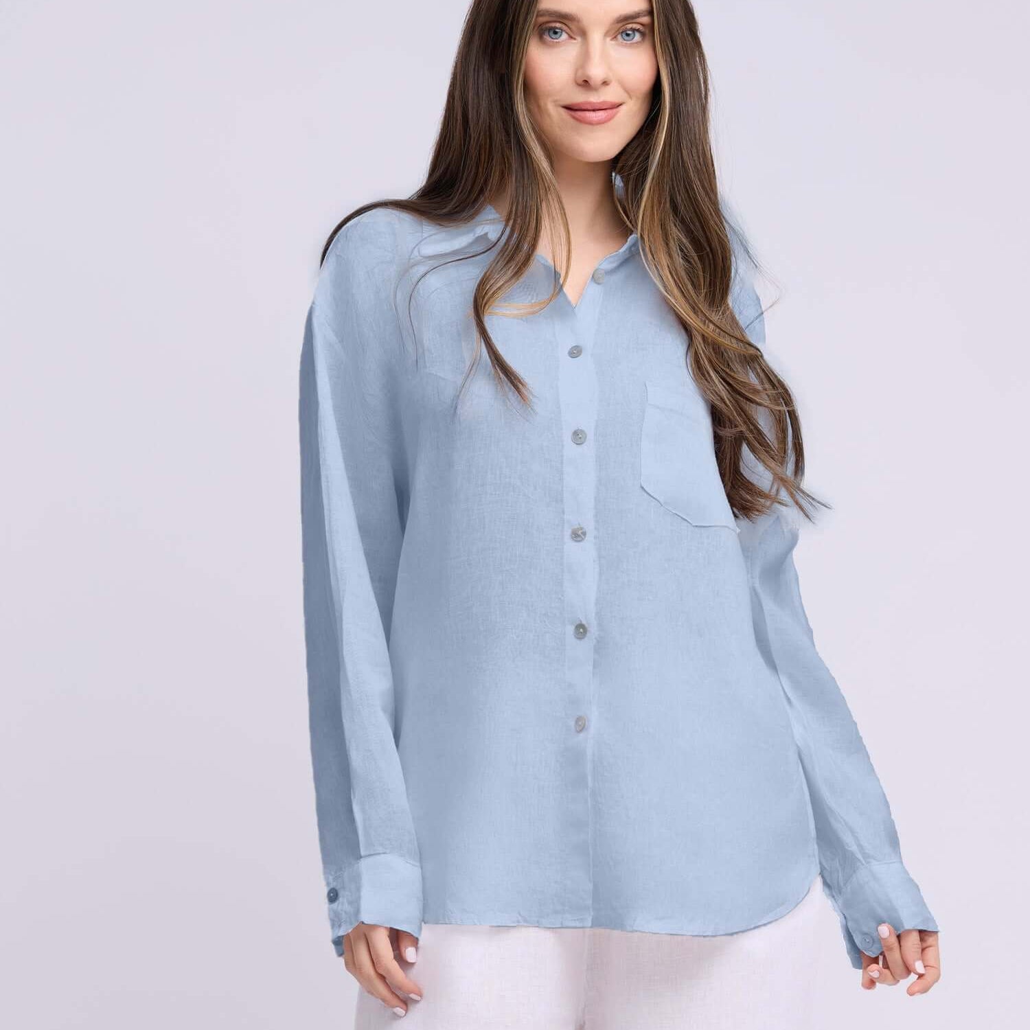 Yoga Jeans Elena Linen Oversized Button Up Top in soft blue color, featuring a relaxed fit and stylish button-up design.