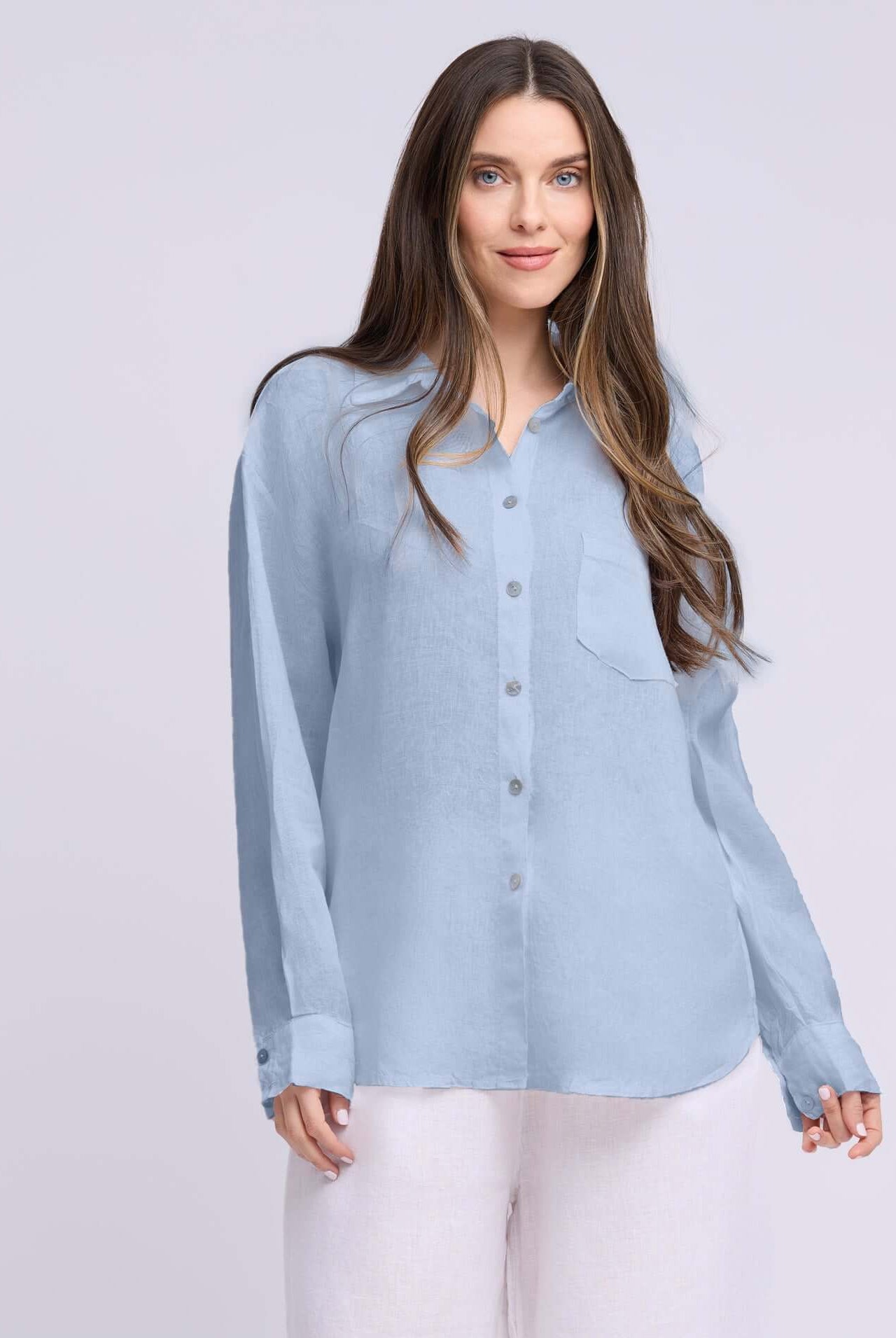 Yoga Jeans Elena Linen Oversized Button Up Top in soft blue color, featuring a relaxed fit and stylish button-up design.