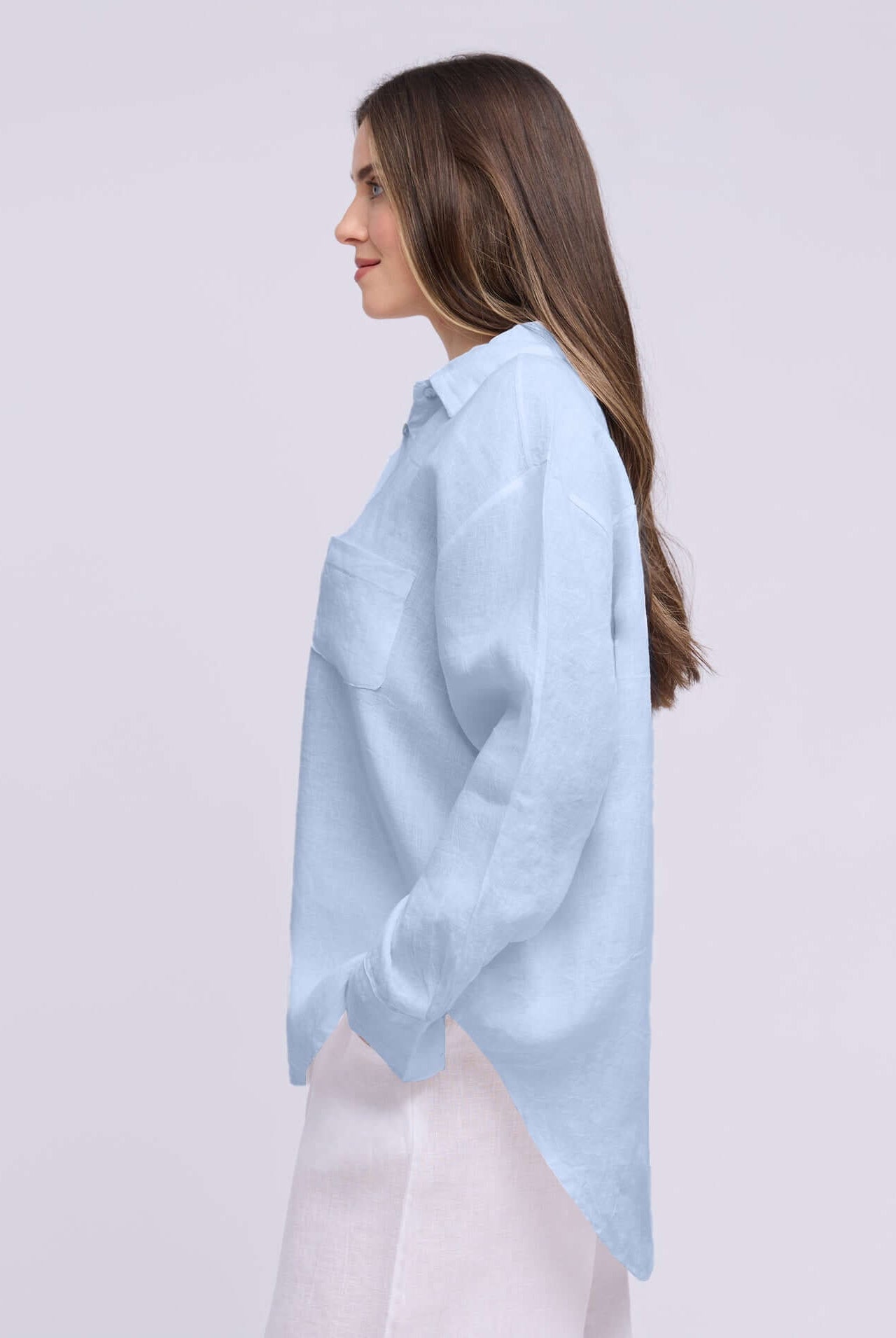 Yoga Jeans Elena Linen Oversized Button Up Top in light blue, featuring a relaxed fit and single chest pocket.