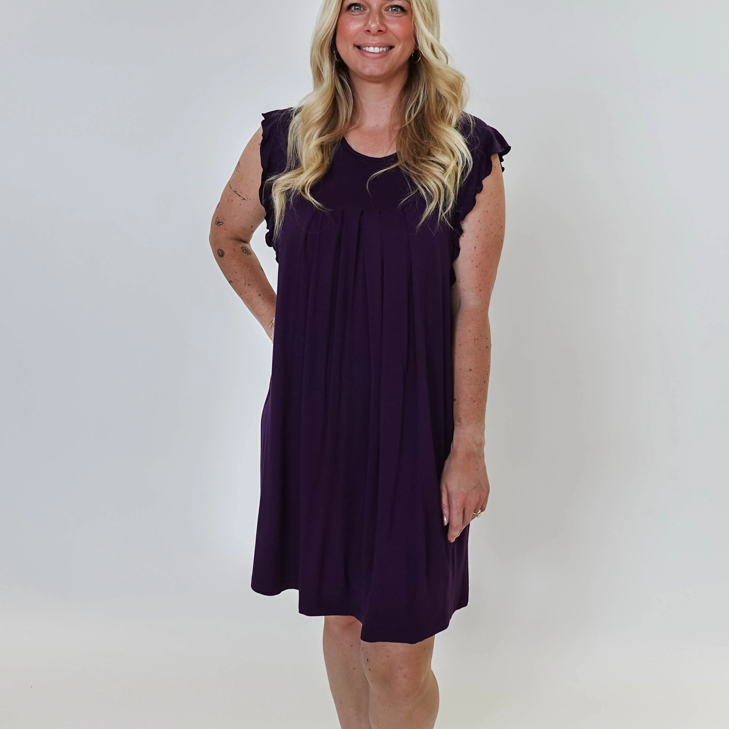Model wearing Blackberry Amethyst Flutter Bamboo Nightgown in purple, showcasing its elegant design and comfortable fit.