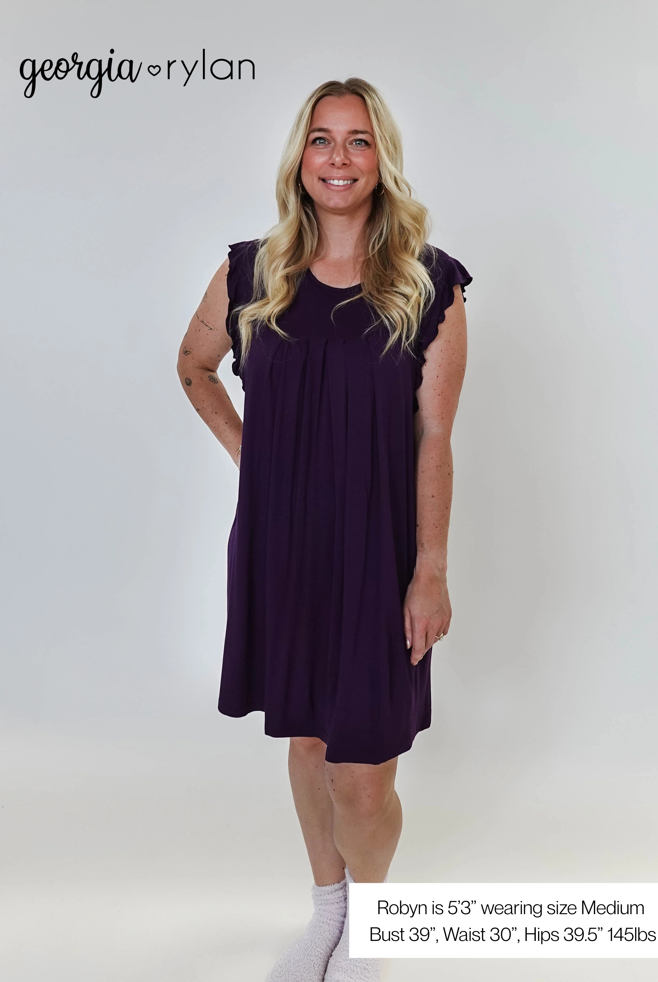 Model wearing Blackberry Amethyst Flutter Bamboo Nightgown in purple, showcasing its elegant design and comfortable fit.