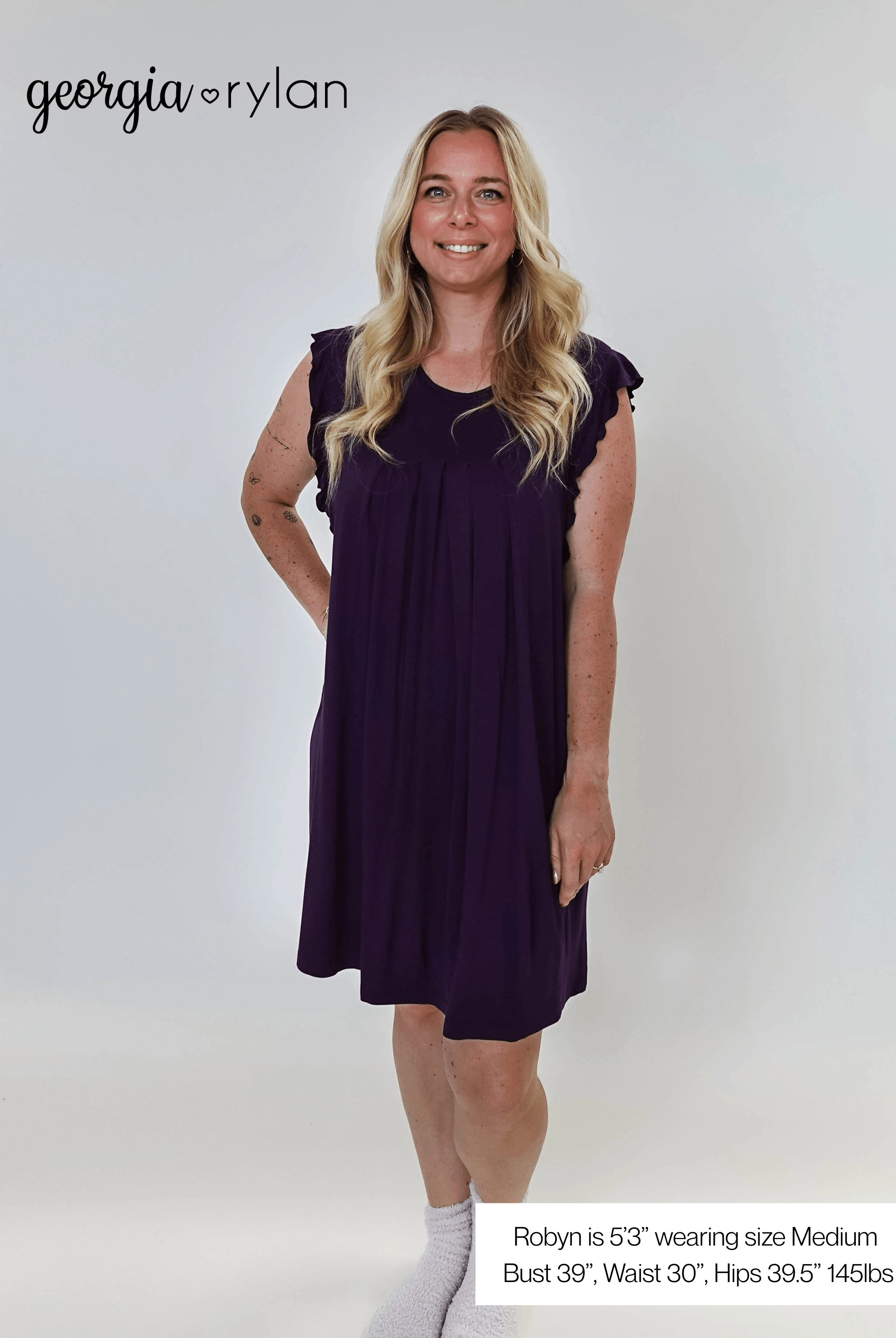 Model wearing Blackberry Amethyst Flutter Bamboo Nightgown in purple, showcasing its elegant design and comfortable fit.