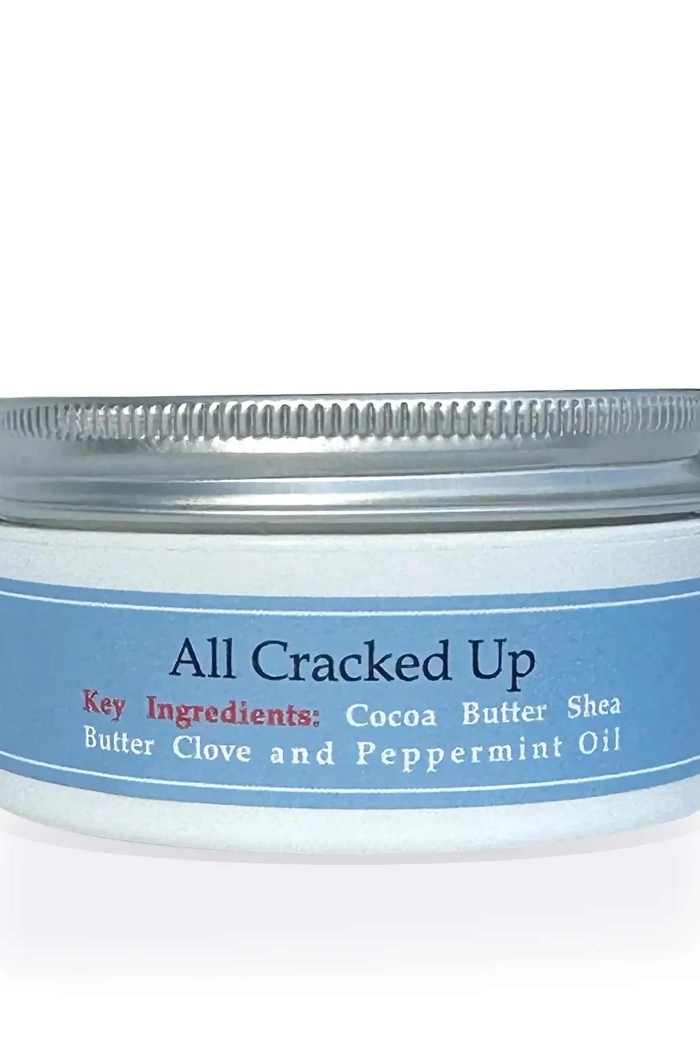 All Cracked Up Foot Balm in a jar, featuring Cocoa Butter, Shea Butter, Clove, and Peppermint Oil.