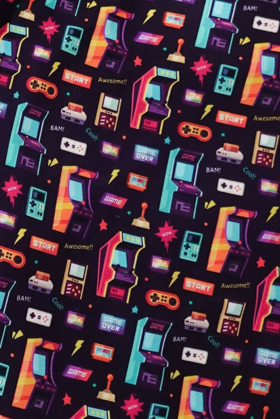Colorful pattern featuring arcade machines and video game controllers, inspired by Arcade After Dark Unisex Bamboo Jogger.