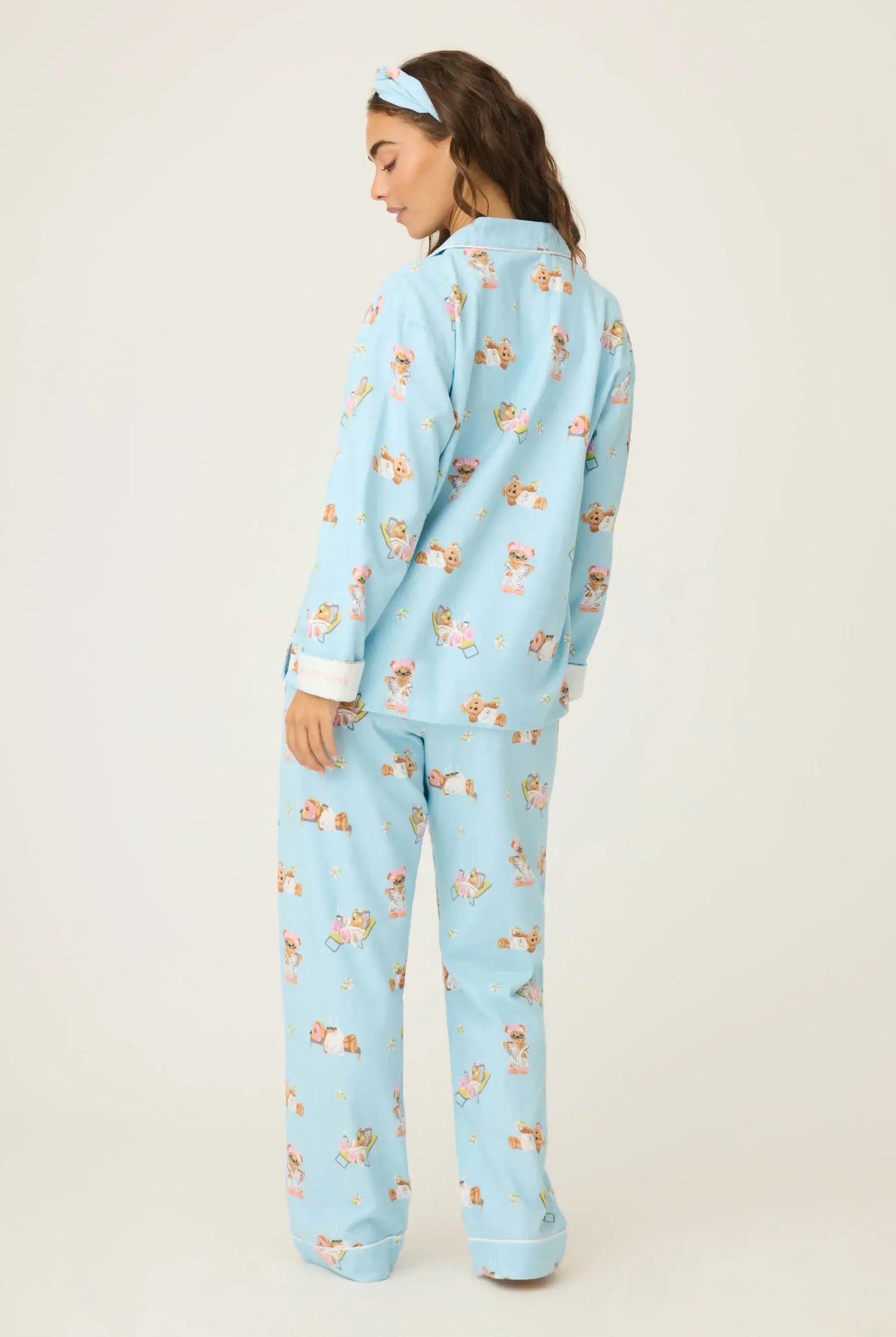 Beary Cute Bear Print Flannel PJ Set from PJ Salvage, featuring a woman wearing blue pajamas with bear print.
