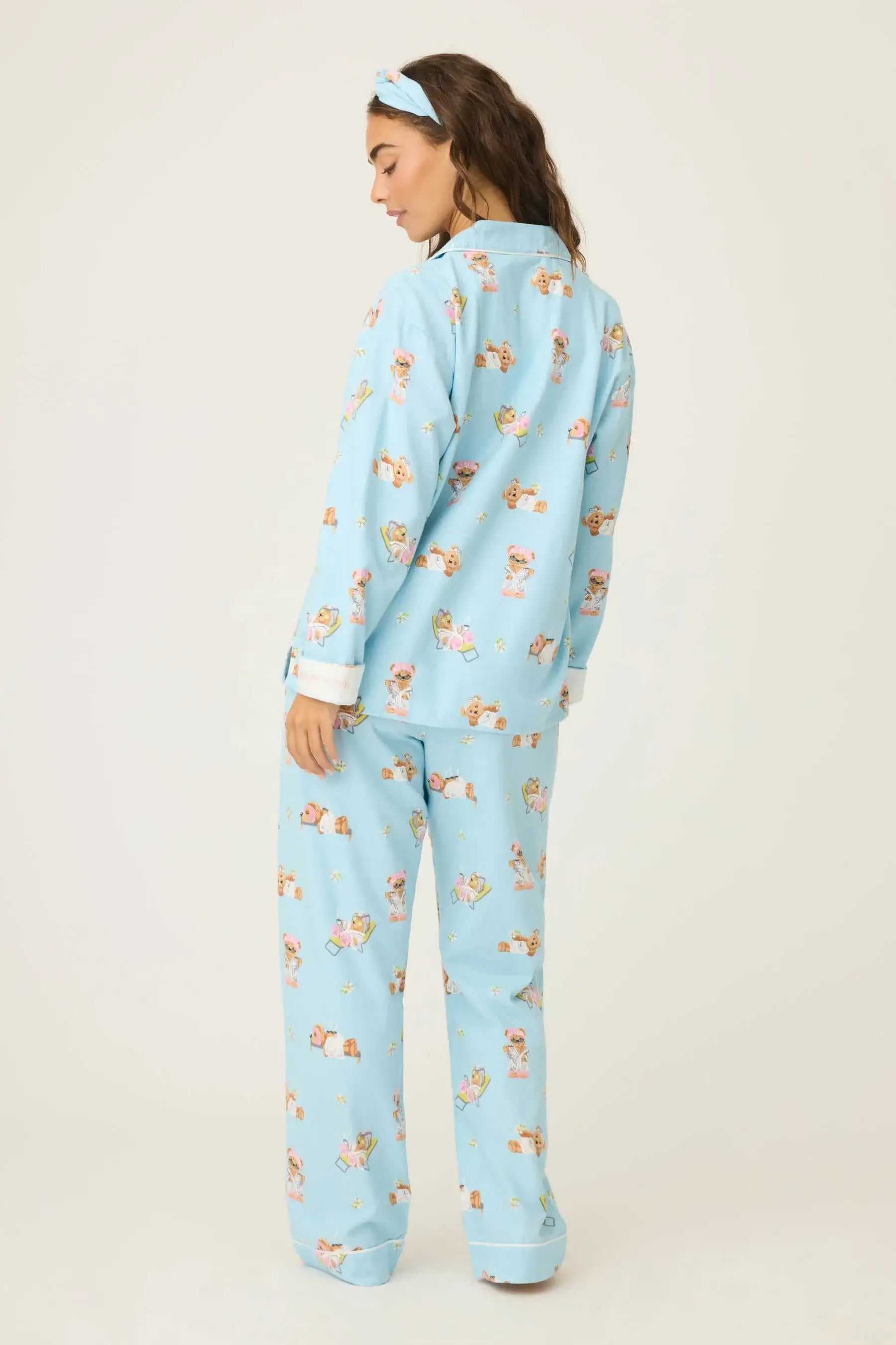Beary Cute Bear Print Flannel PJ Set from PJ Salvage, featuring a woman wearing blue pajamas with bear print.
