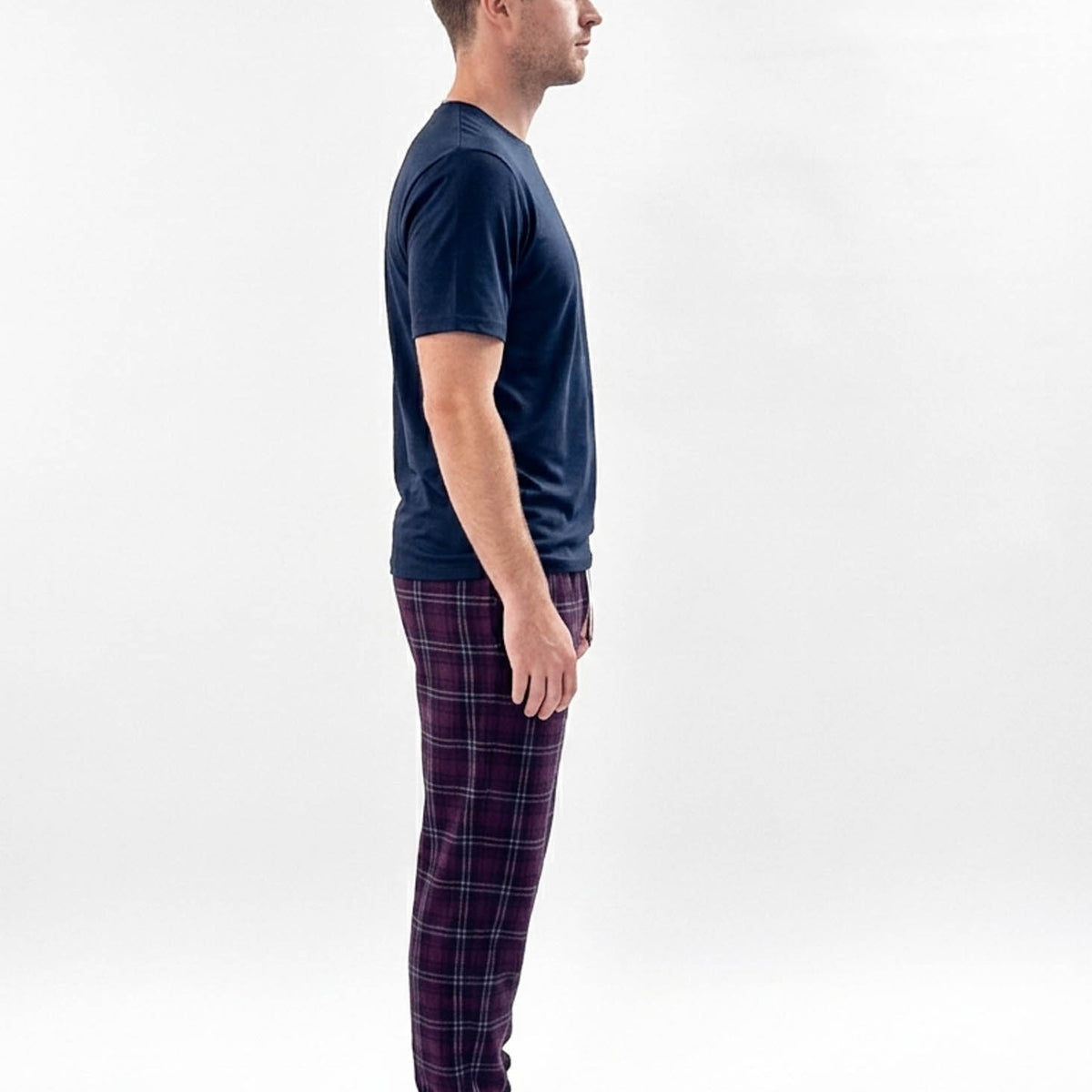 Bob's Sleepwear Co. Dark Red Plaid Bamboo Jogger Pant side view on model — Cloud Nine Pajamas Edmonton