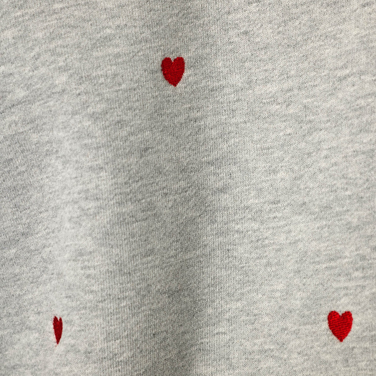 PJ Salvage C'est La Vie Hearts sweatshirt model close-up red heart embroidery detail — Cloud Nine Pajamas