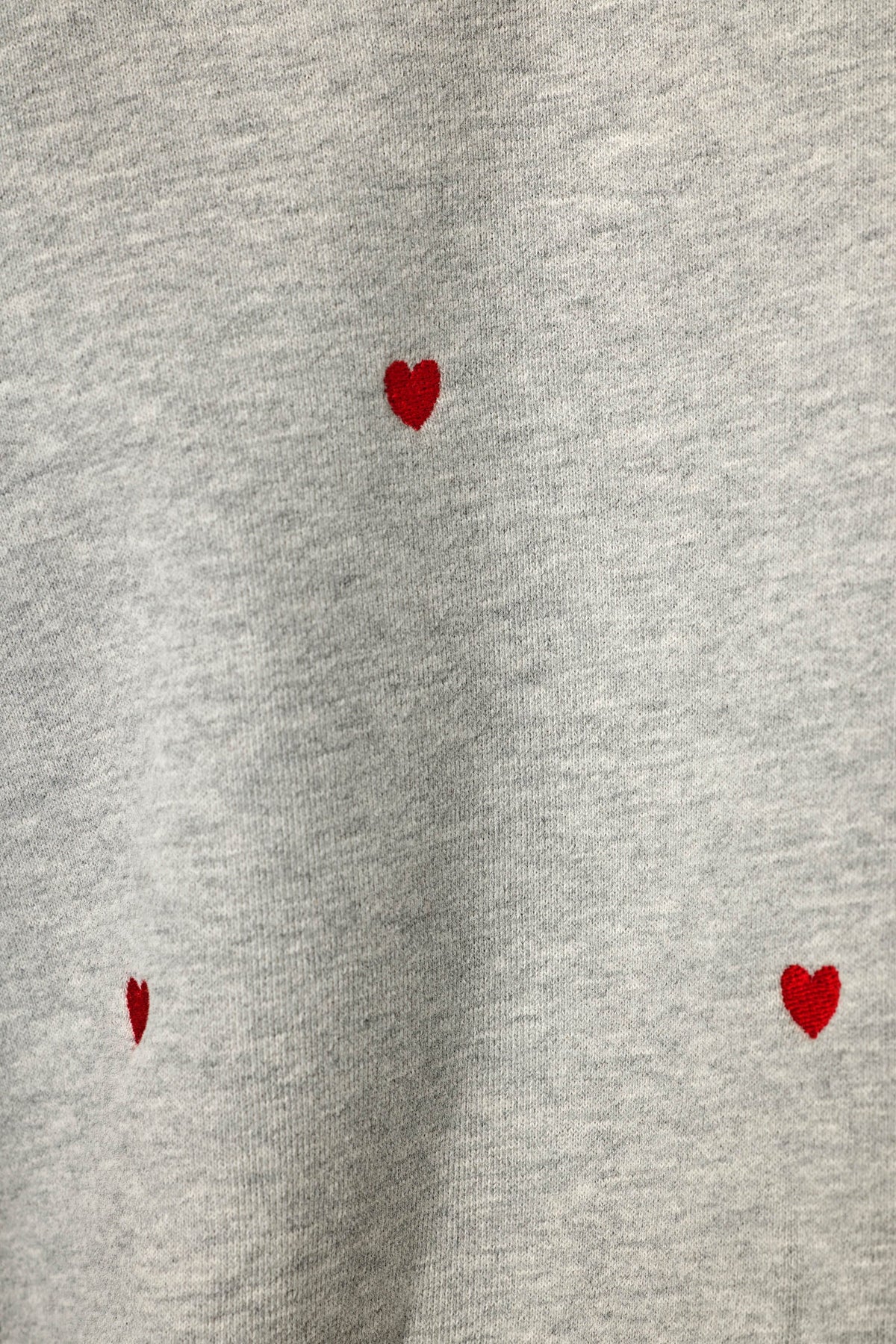 PJ Salvage C'est La Vie Hearts sweatshirt model close-up red heart embroidery detail — Cloud Nine Pajamas
