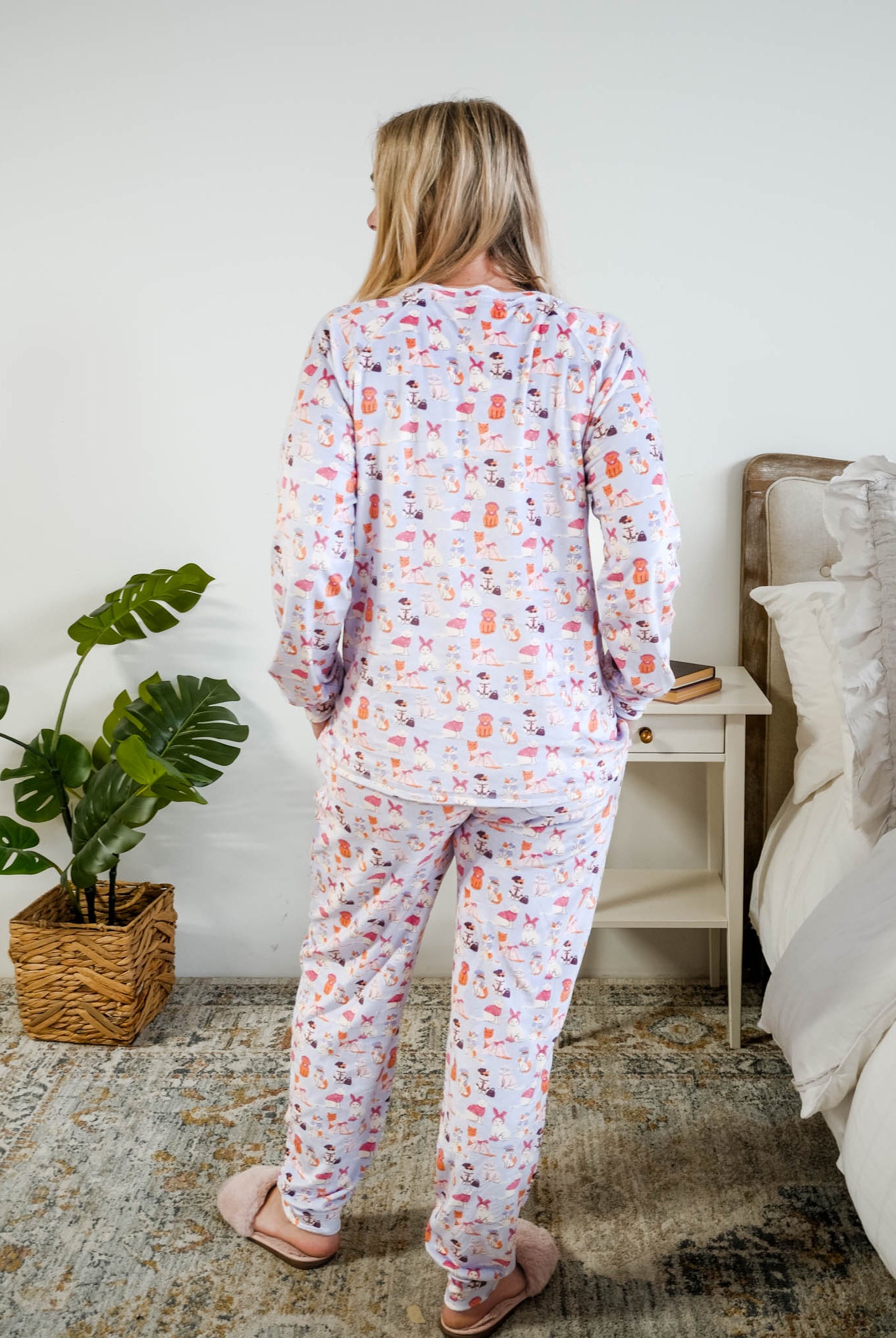 Back full length view of Miranda Nic women's purple velour long sleeve top and jogger pants set featuring Catwalk Kitties cat print- Cloud Nine Pajamas