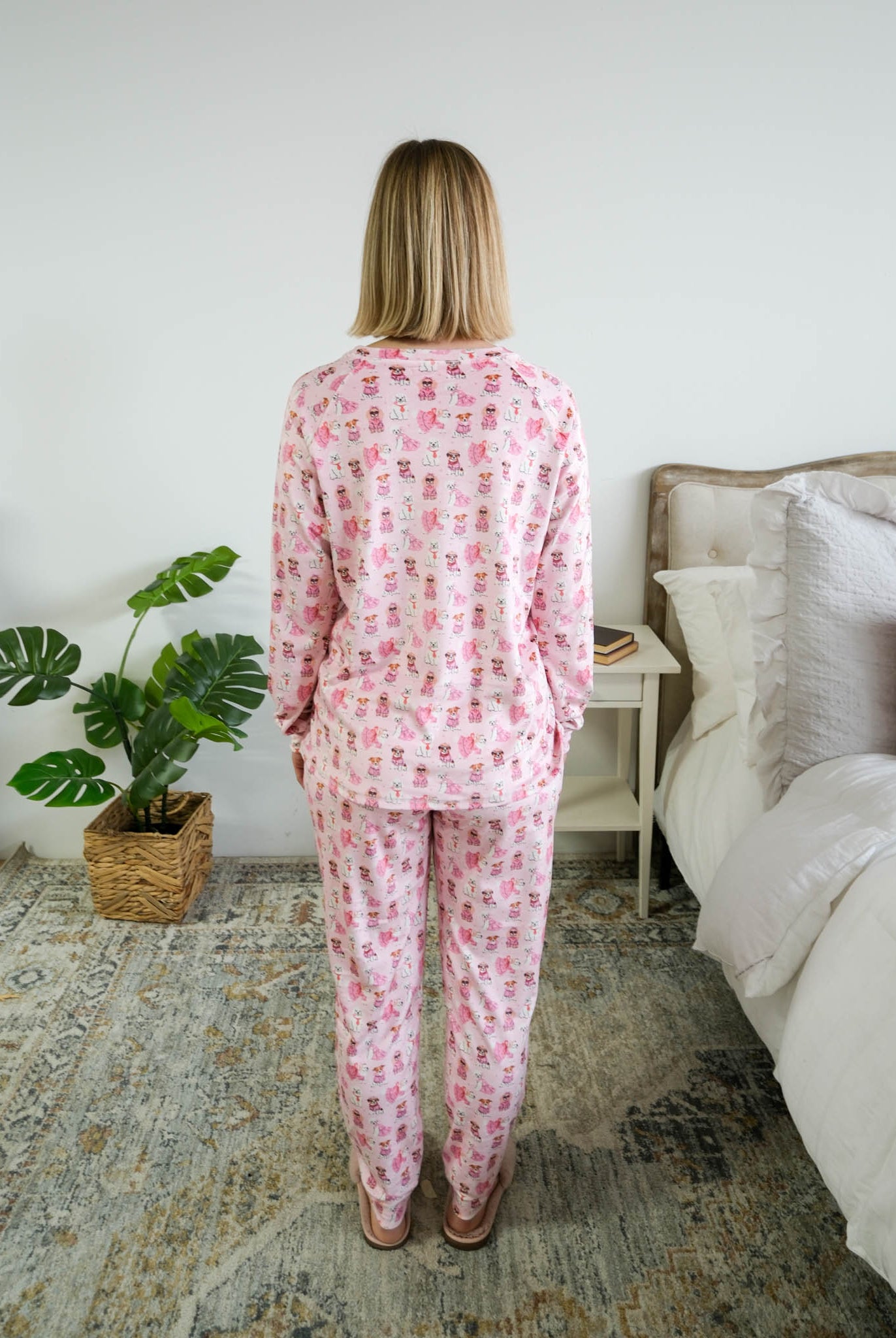 Back view on model of Miranda Nic women's pink velour long sleeve top and jogger pants loungewear set featuring Chic Puppies dog print - Cloud Nine Pajamas