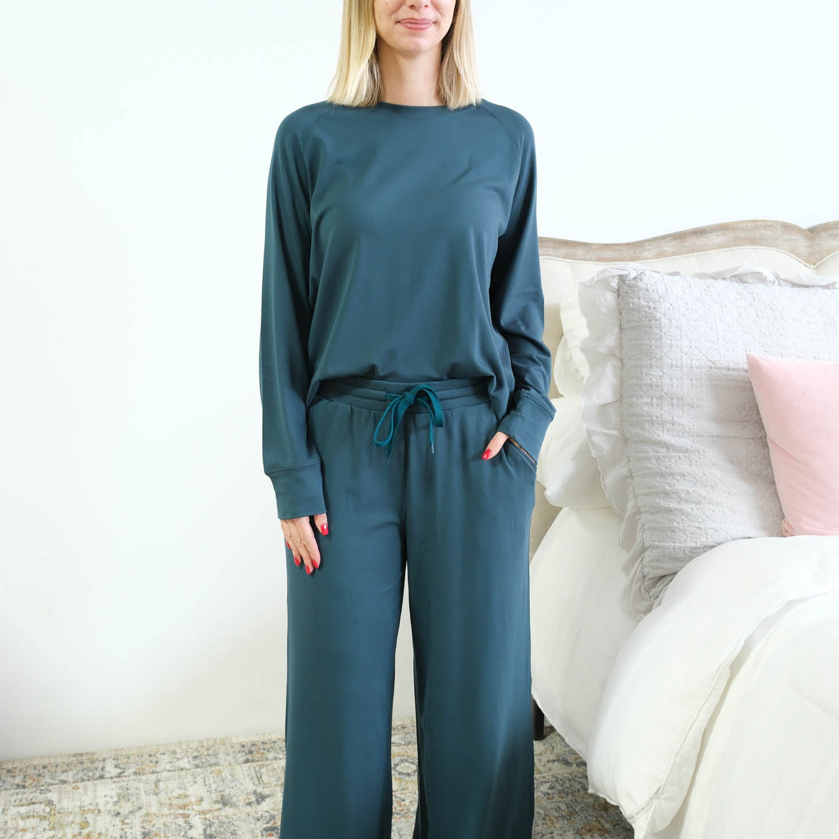 Miranda Nic Cloud Soft Teal Lounge Set model tucked front showing pocket — Cloud Nine Pajamas Edmonton