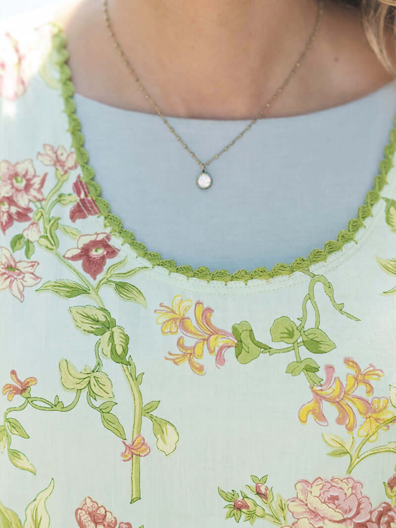 April Cornell Milene Cotton Pinafore Midi Dress Sage Green with Hand-Crochet Neckline showing close up of the neckline