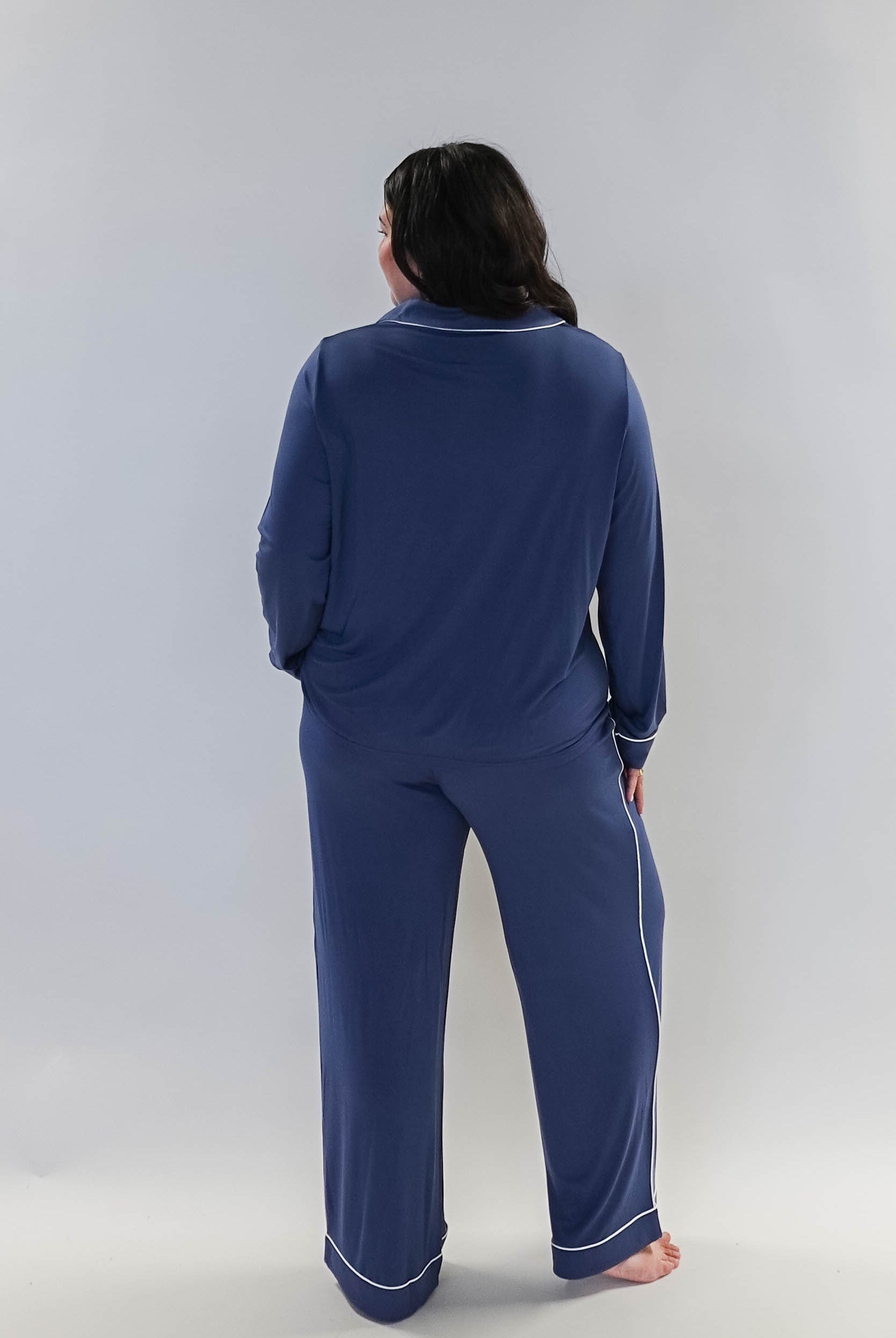 Denim Blue Long Sleeve Button Up Bamboo PJ Set by Georgia Rylan - model shows the back of the pyjama set