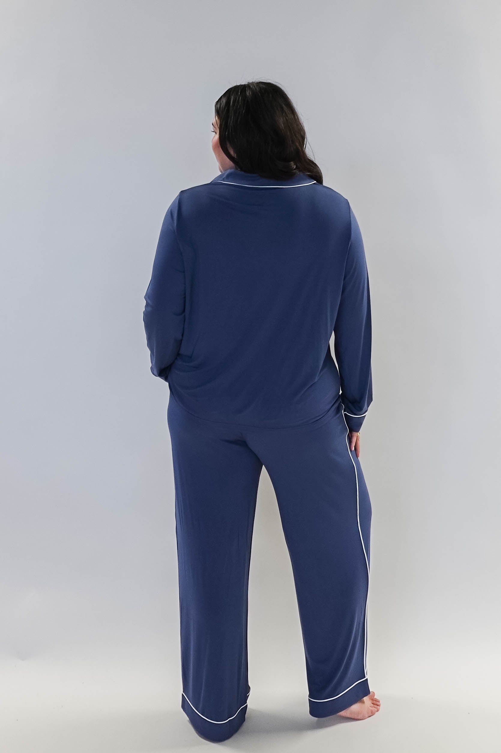 Denim Blue Long Sleeve Button Up Bamboo PJ Set by Georgia Rylan - model shows the back of the pyjama set
