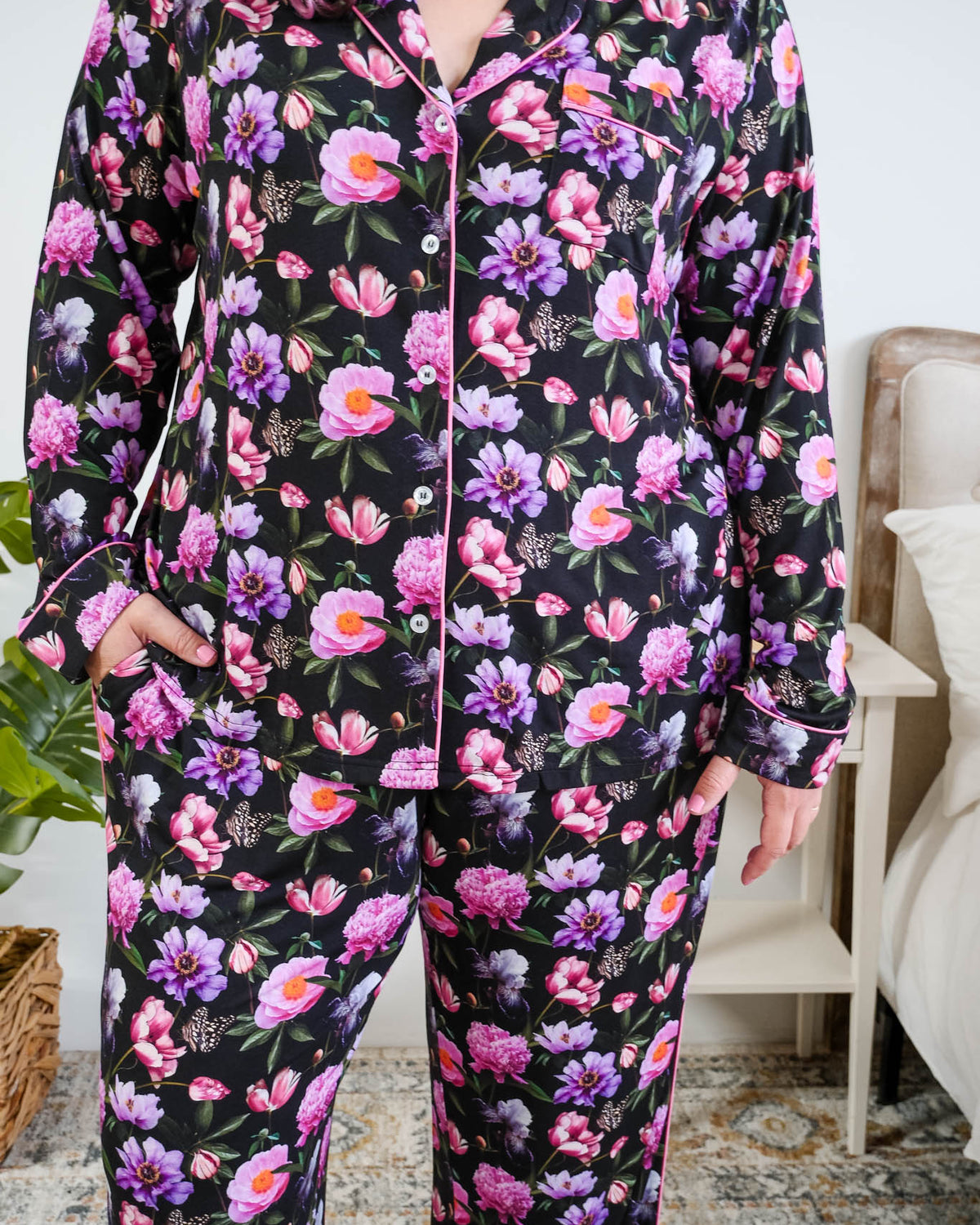 Georgia Rylan women's bamboo long sleeve button-up top and straight-leg pajama pants in Dreamy Blooms black floral print - Cloud Nine Pajamas close up of button up front