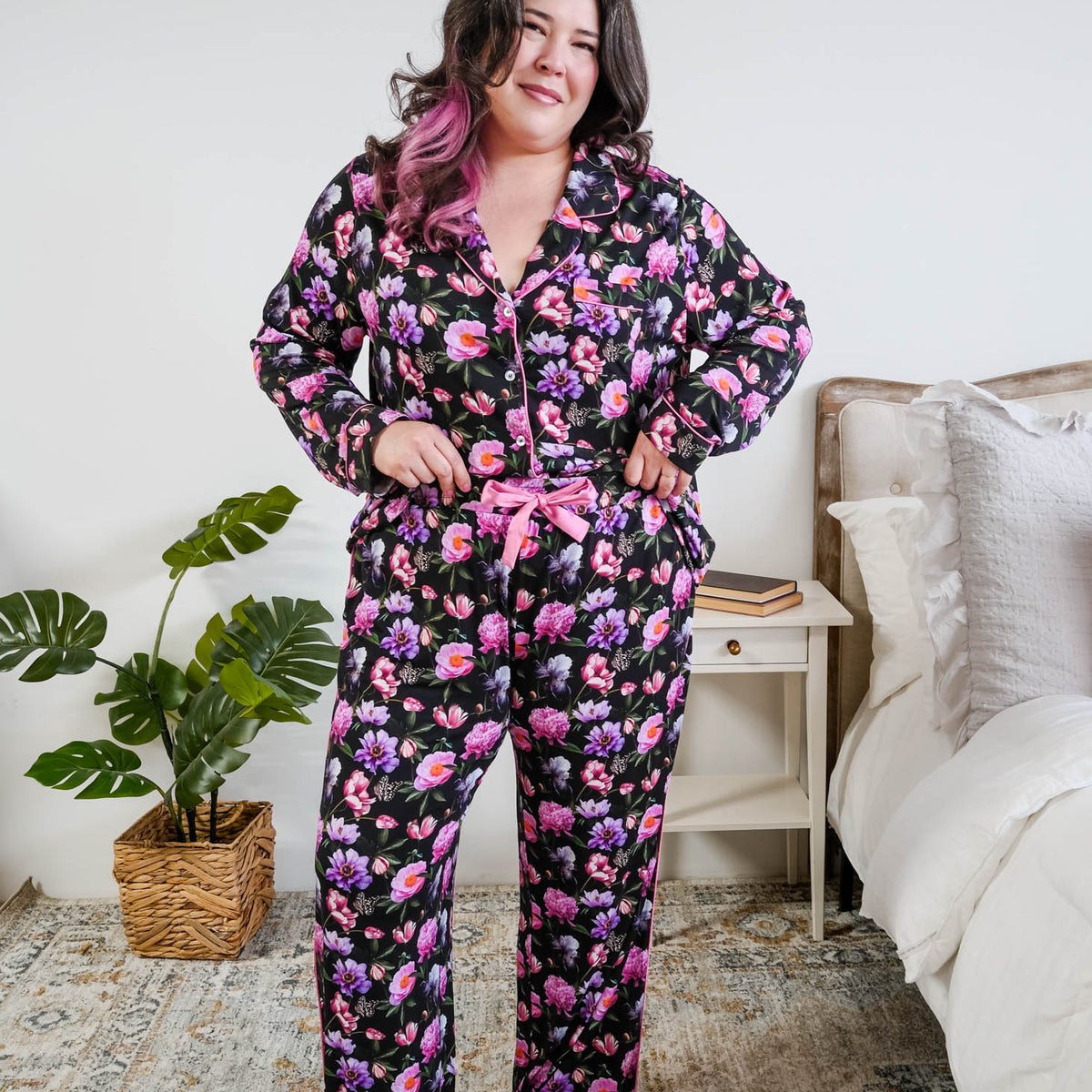 Georgia Rylan women's bamboo long sleeve button-up top and straight-leg pajama pants in Dreamy Blooms black floral print - Cloud Nine Pajamas shown tucked in to show the satin drawstring