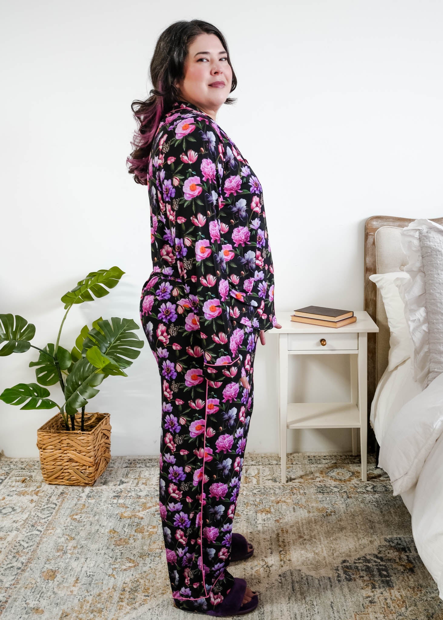 Georgia Rylan women's bamboo long sleeve button-up top and straight-leg pajama pants in Dreamy Blooms black floral print - Cloud Nine Pajamas side profile on plus size model