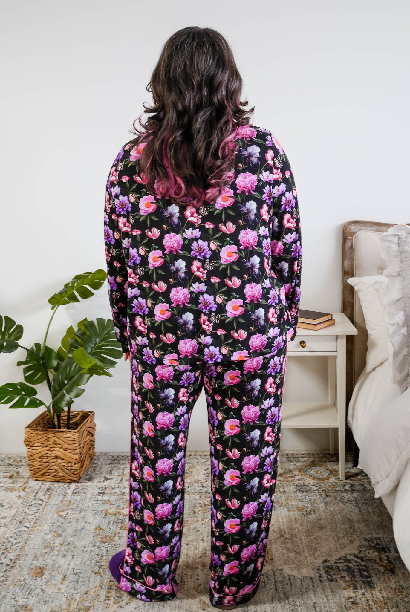 Georgia Rylan women's bamboo long sleeve button-up top and straight-leg pajama pants in Dreamy Blooms black floral print - Cloud Nine Pajamas back view on plus size model