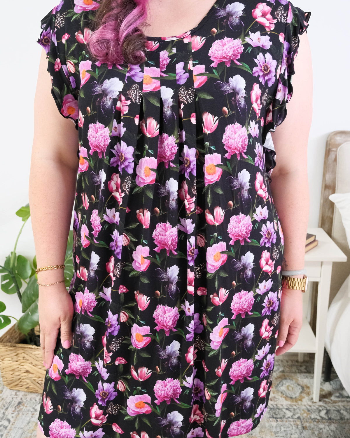 Georgia Rylan women's bamboo flutter sleeve nightgown dress in Dreamy Blooms black floral print - Cloud Nine Pajamas pleated front of the nightgown on plus size model