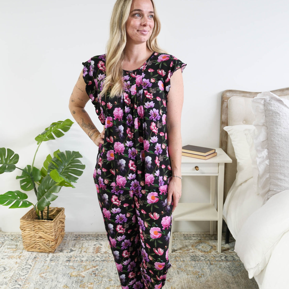 Georgia Rylan women's bamboo flutter sleeve top and soft jogger pajama pants set in Dreamy Blooms black floral print full length on model - Cloud Nine Pajamas