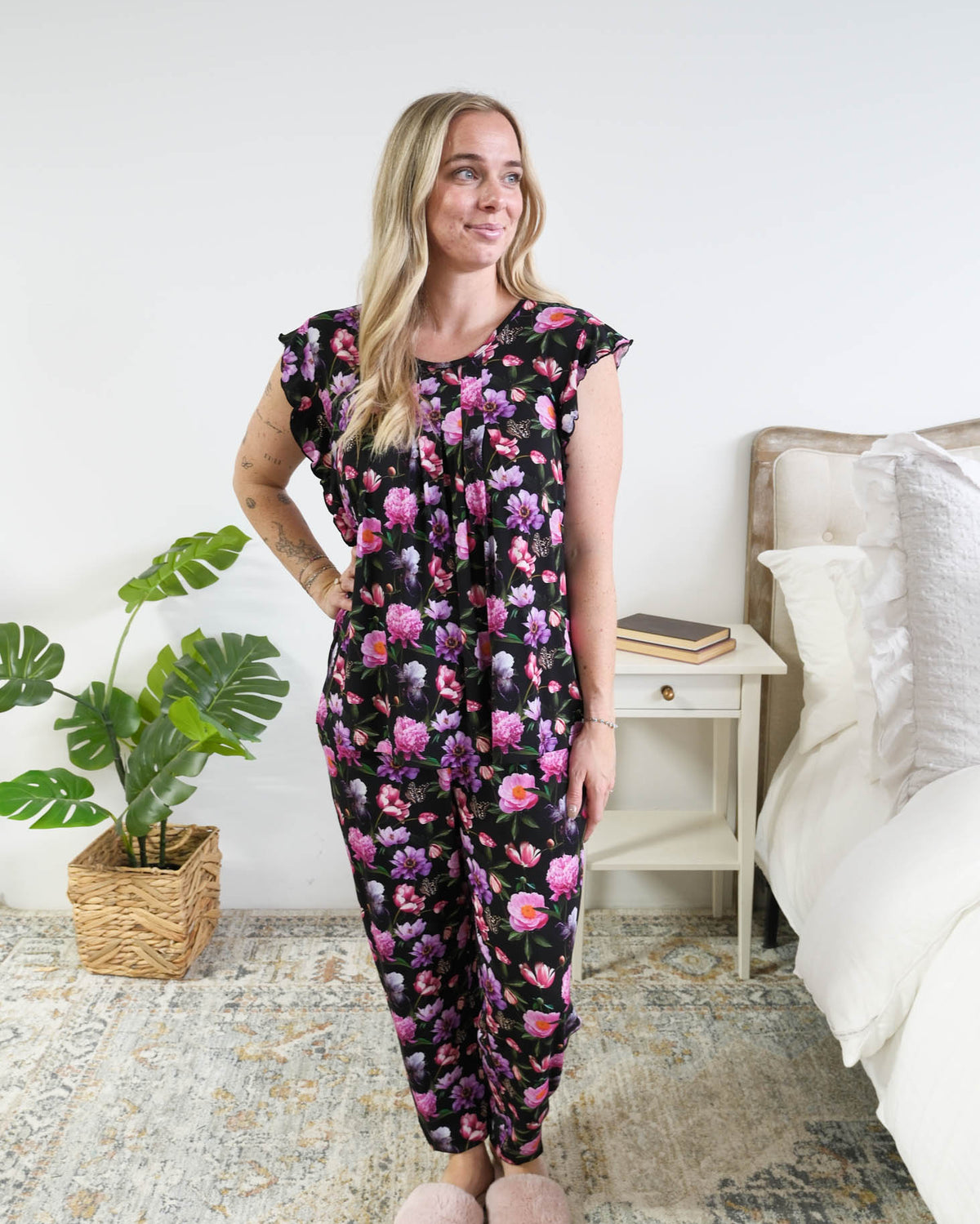 Georgia Rylan women's bamboo flutter sleeve top and soft jogger pajama pants set in Dreamy Blooms black floral print full length on model - Cloud Nine Pajamas