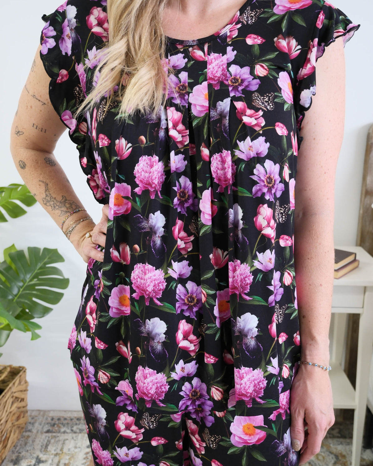 Georgia Rylan women's bamboo flutter sleeve top and soft jogger pajama pants set in Dreamy Blooms black floral print close up of print and pleated front detail
