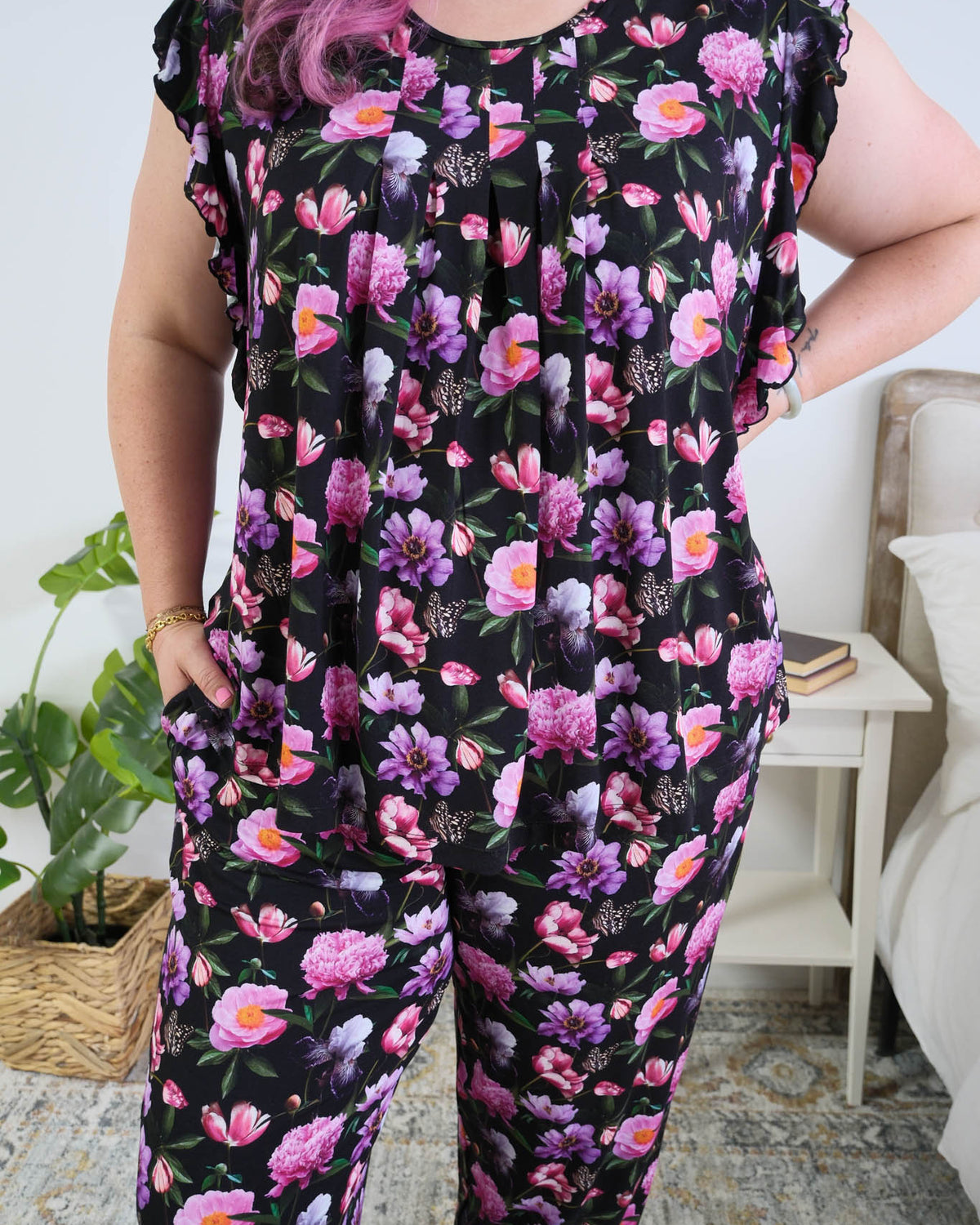 Georgia Rylan women's bamboo flutter sleeve top and soft jogger pajama pants set in Dreamy Blooms black floral print - Cloud Nine Pajamas pleated front detail on plus size model