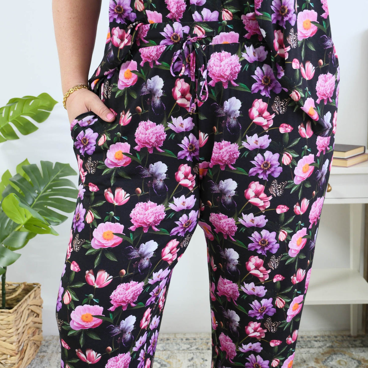 Georgia Rylan women's bamboo flutter sleeve top and soft jogger pajama pants set in Dreamy Blooms black floral print - Cloud Nine Pajamas close up of the print on plus size model