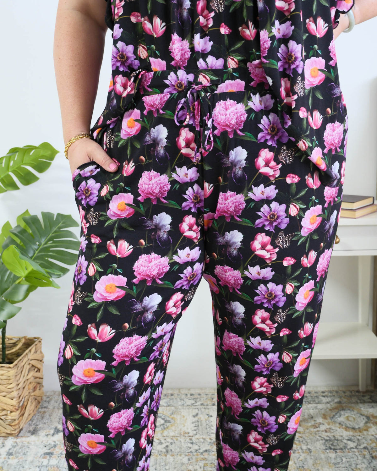 Georgia Rylan women's bamboo flutter sleeve top and soft jogger pajama pants set in Dreamy Blooms black floral print - Cloud Nine Pajamas close up of the print on plus size model