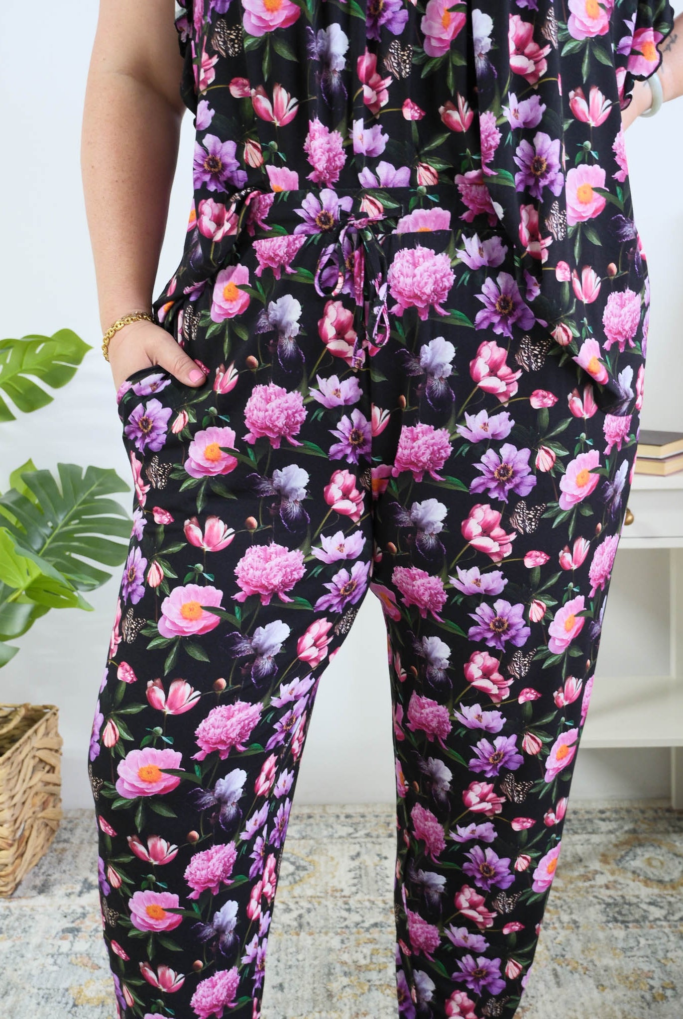Georgia Rylan women's bamboo flutter sleeve top and soft jogger pajama pants set in Dreamy Blooms black floral print - Cloud Nine Pajamas close up of the print on plus size model