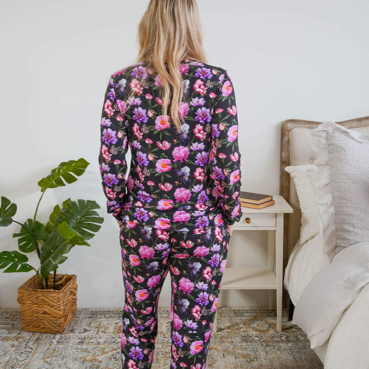Georgia Rylan women's long sleeve crewneck top and jogger pajama pants set in Dreamy Blooms black floral bamboo Cloud Nine Pajamas back view on model size small