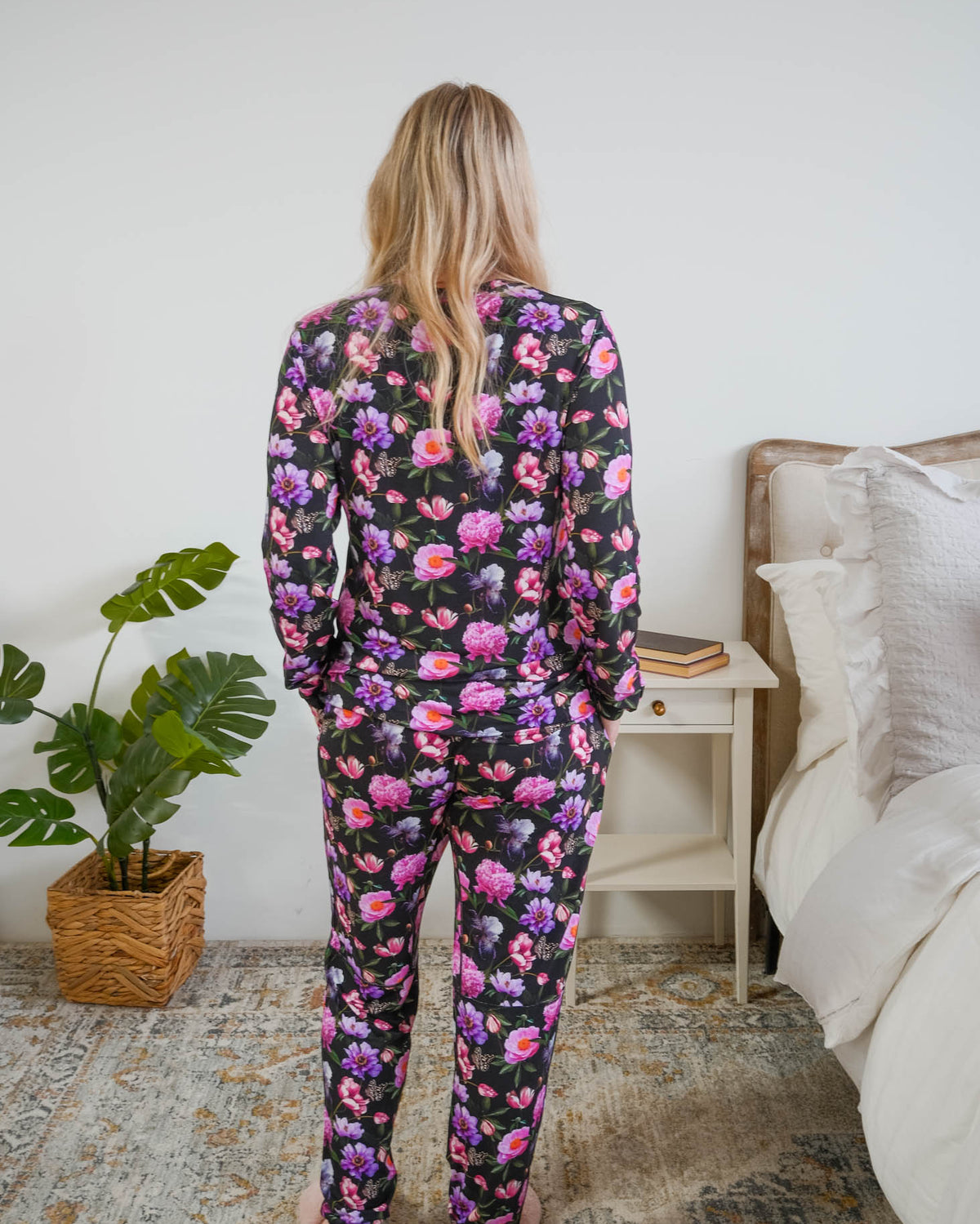 Georgia Rylan women's long sleeve crewneck top and jogger pajama pants set in Dreamy Blooms black floral bamboo Cloud Nine Pajamas back view on model size small