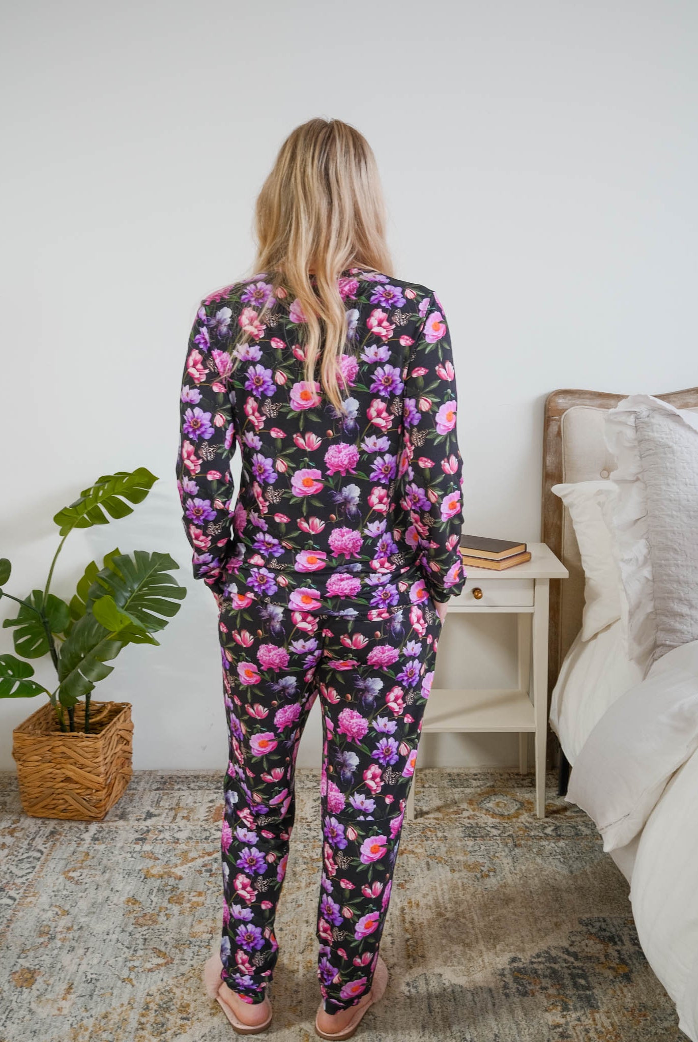 Georgia Rylan women's long sleeve crewneck top and jogger pajama pants set in Dreamy Blooms black floral bamboo Cloud Nine Pajamas back view on model size small