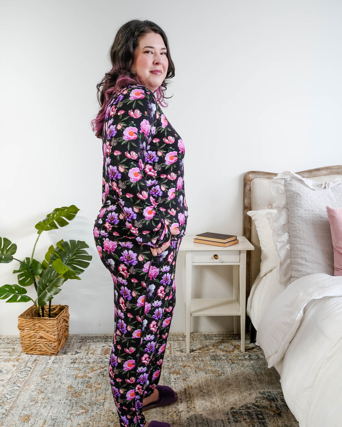 Georgia Rylan women's long sleeve crewneck top and jogger pajama pants set in Dreamy Blooms black floral bamboo Cloud Nine Pajamas side view on plus size model with black hair