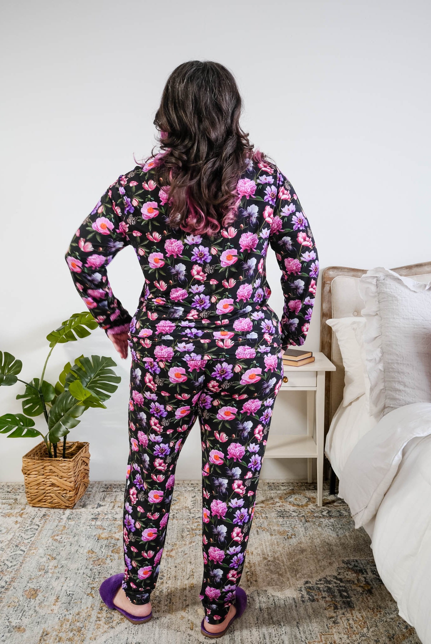Georgia Rylan women's long sleeve crewneck top and jogger pajama pants set in Dreamy Blooms black floral bamboo Cloud Nine Pajamas back view on plus size model