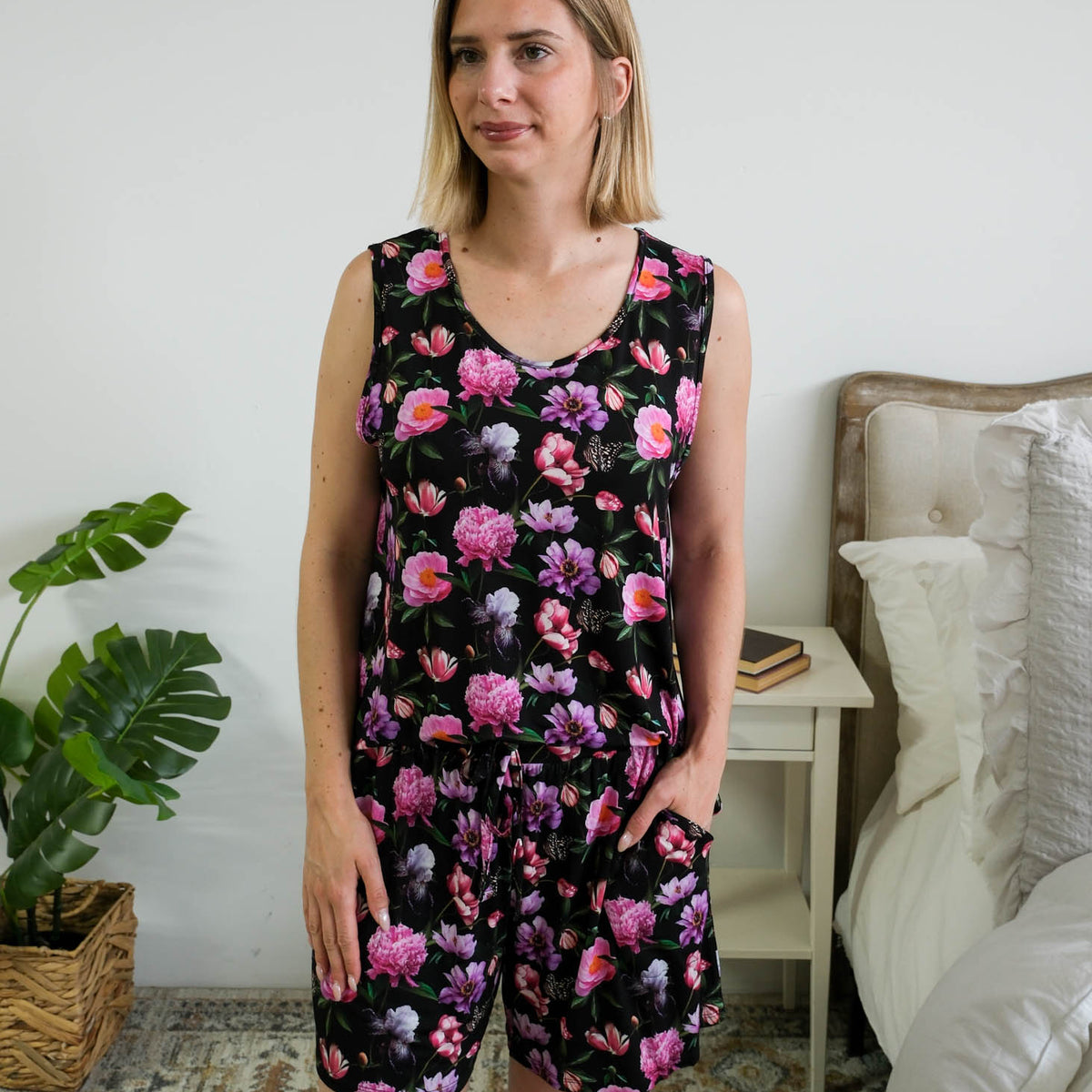 Georgia Rylan women's bamboo tank top and matching pajama shorts set in Dreamy Blooms black floral print - Cloud Nine Pajama shown tucked in on model