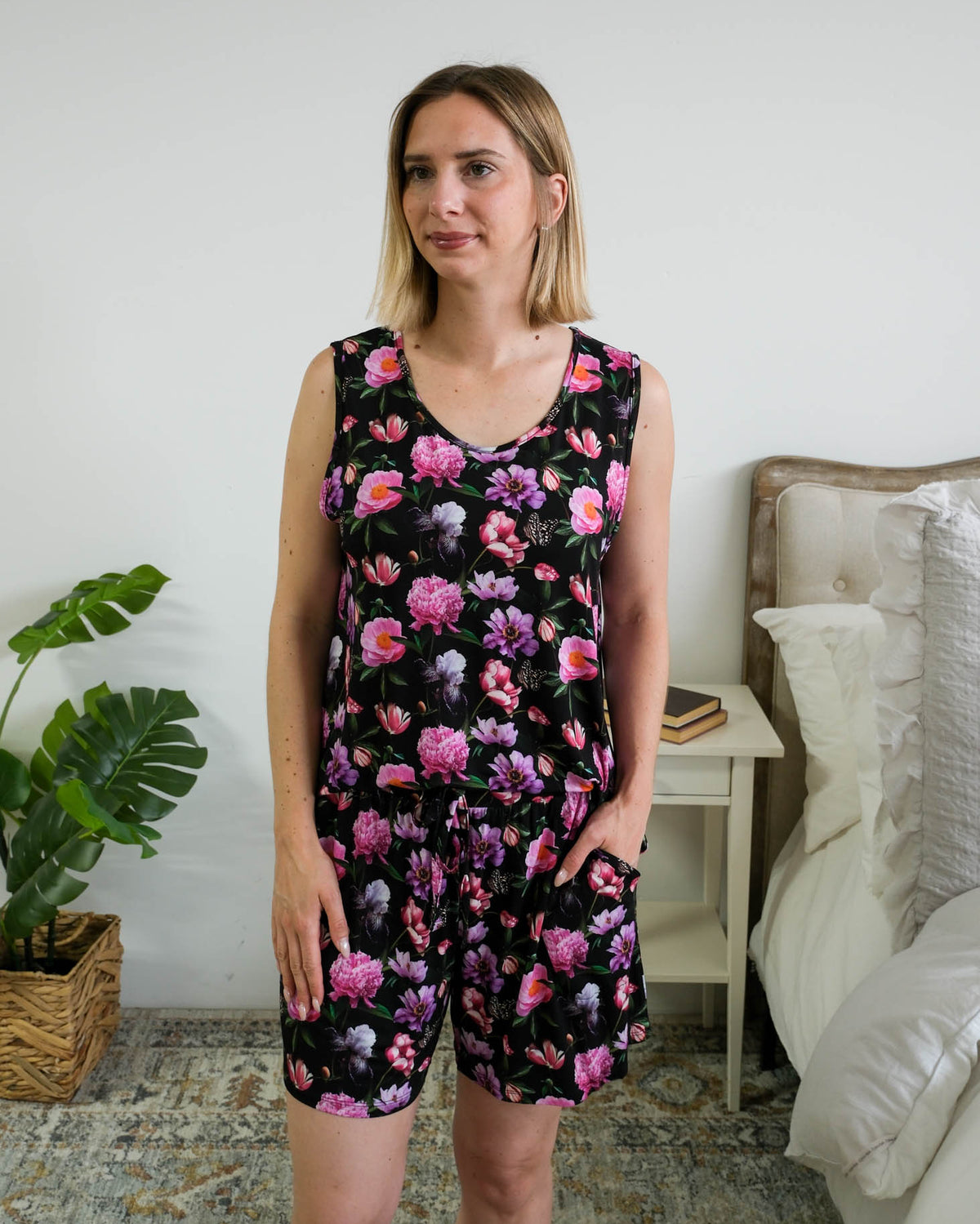 Georgia Rylan women's bamboo tank top and matching pajama shorts set in Dreamy Blooms black floral print - Cloud Nine Pajama shown tucked in on model