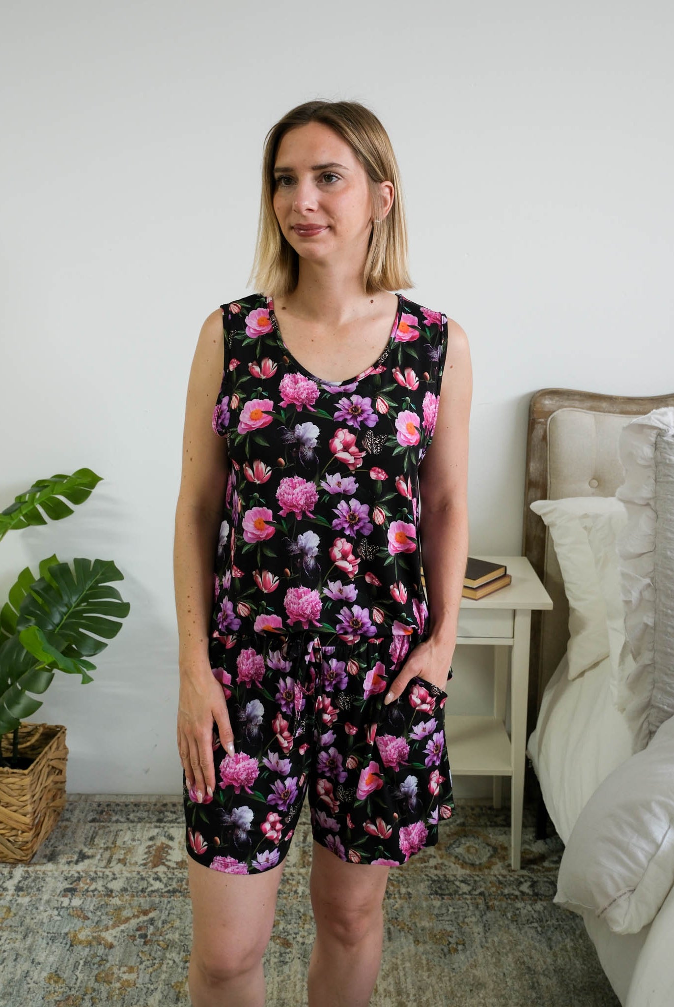 Georgia Rylan women's bamboo tank top and matching pajama shorts set in Dreamy Blooms black floral print - Cloud Nine Pajama shown tucked in on model