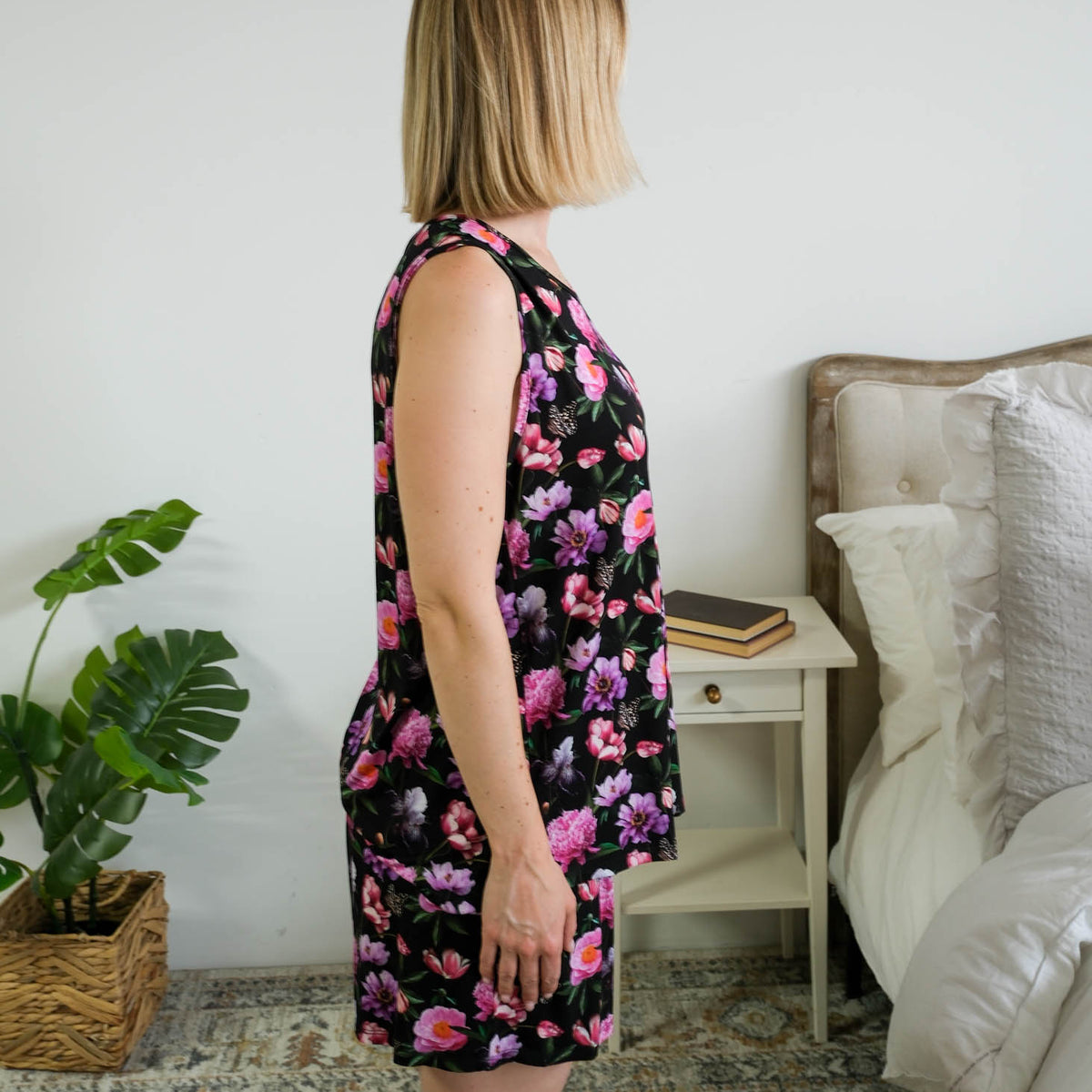 Georgia Rylan women's bamboo tank top and matching pajama shorts set in Dreamy Blooms black floral print - Cloud Nine Pajamas side profile shown on model