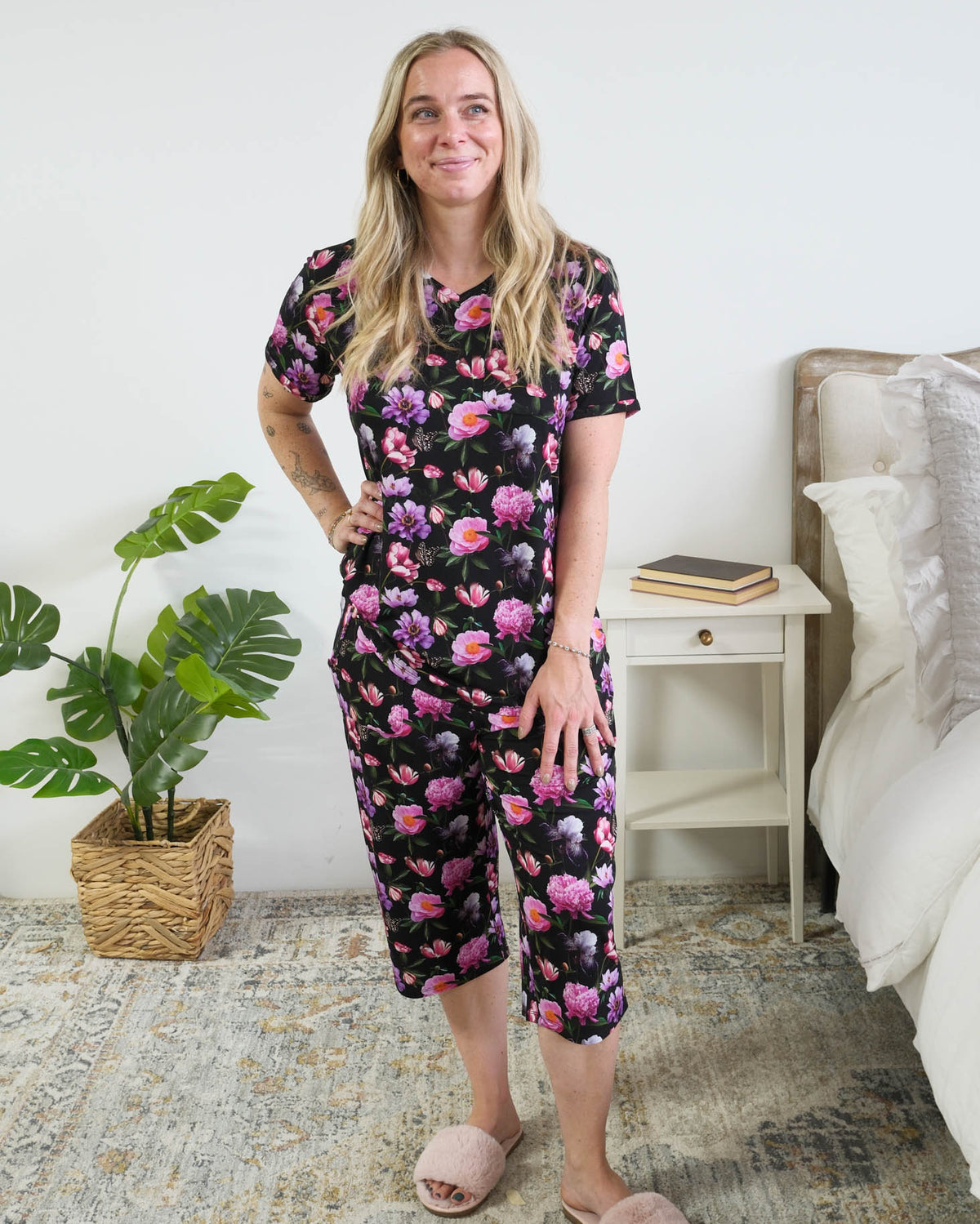 Georgia Rylan women's bamboo rolled-sleeve t-shirt and capri pajama pants in Dreamy Blooms black floral print - Cloud Nine Pajamas full length view on model