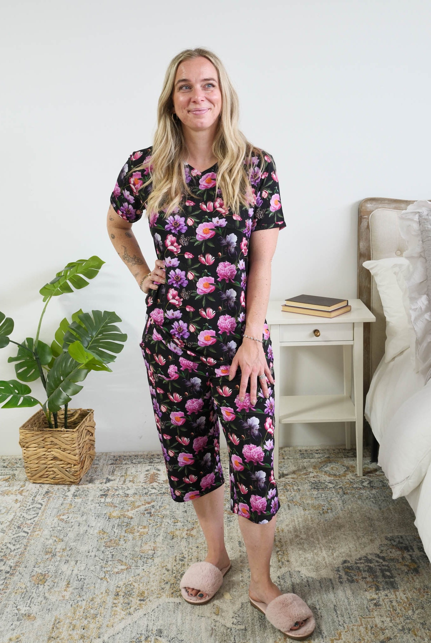 Georgia Rylan women's bamboo rolled-sleeve t-shirt and capri pajama pants in Dreamy Blooms black floral print - Cloud Nine Pajamas full length view on model