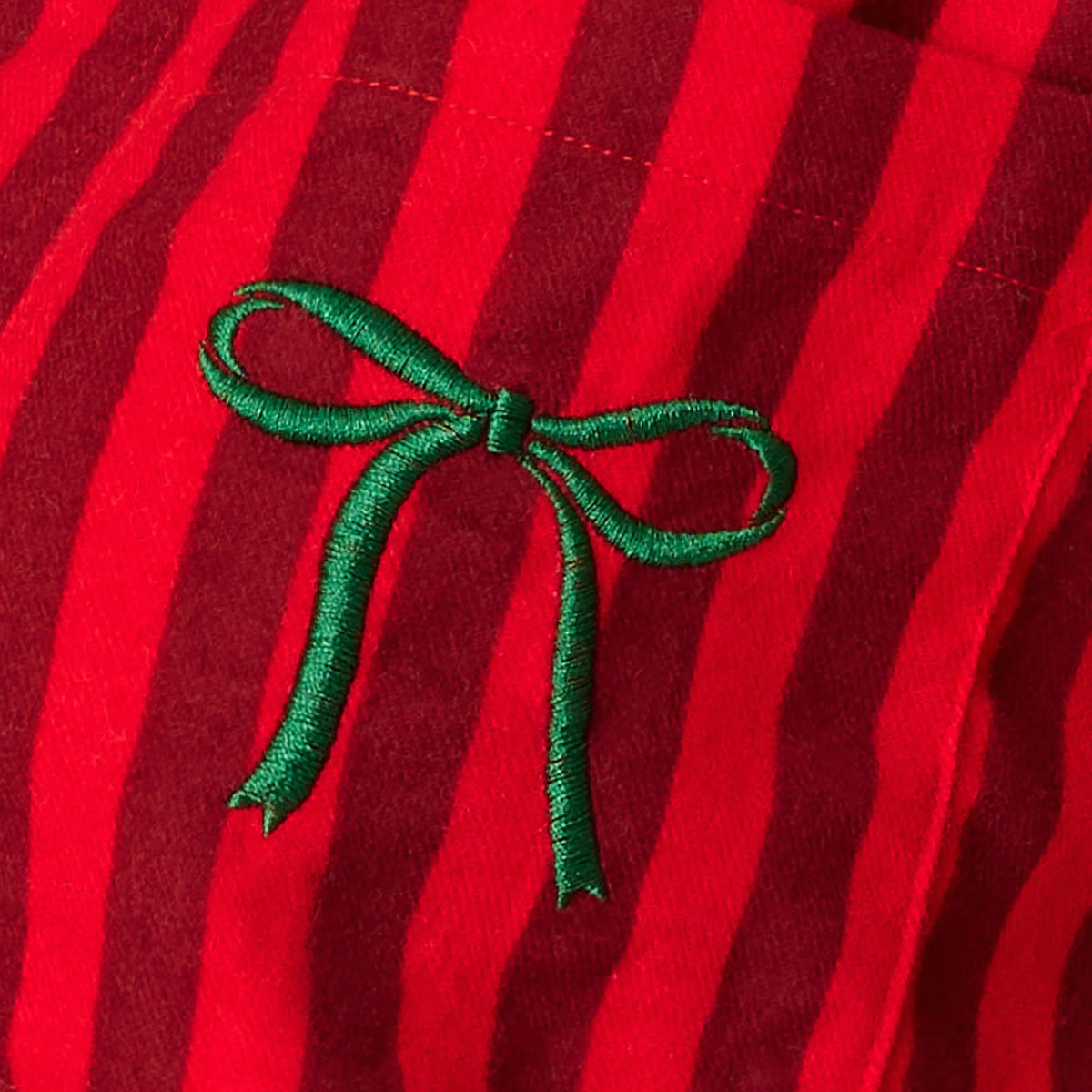 PJ Salvage Bow Icon Flannel Set embroidered green bow pocket detail close-up — Cloud Nine Pajamas