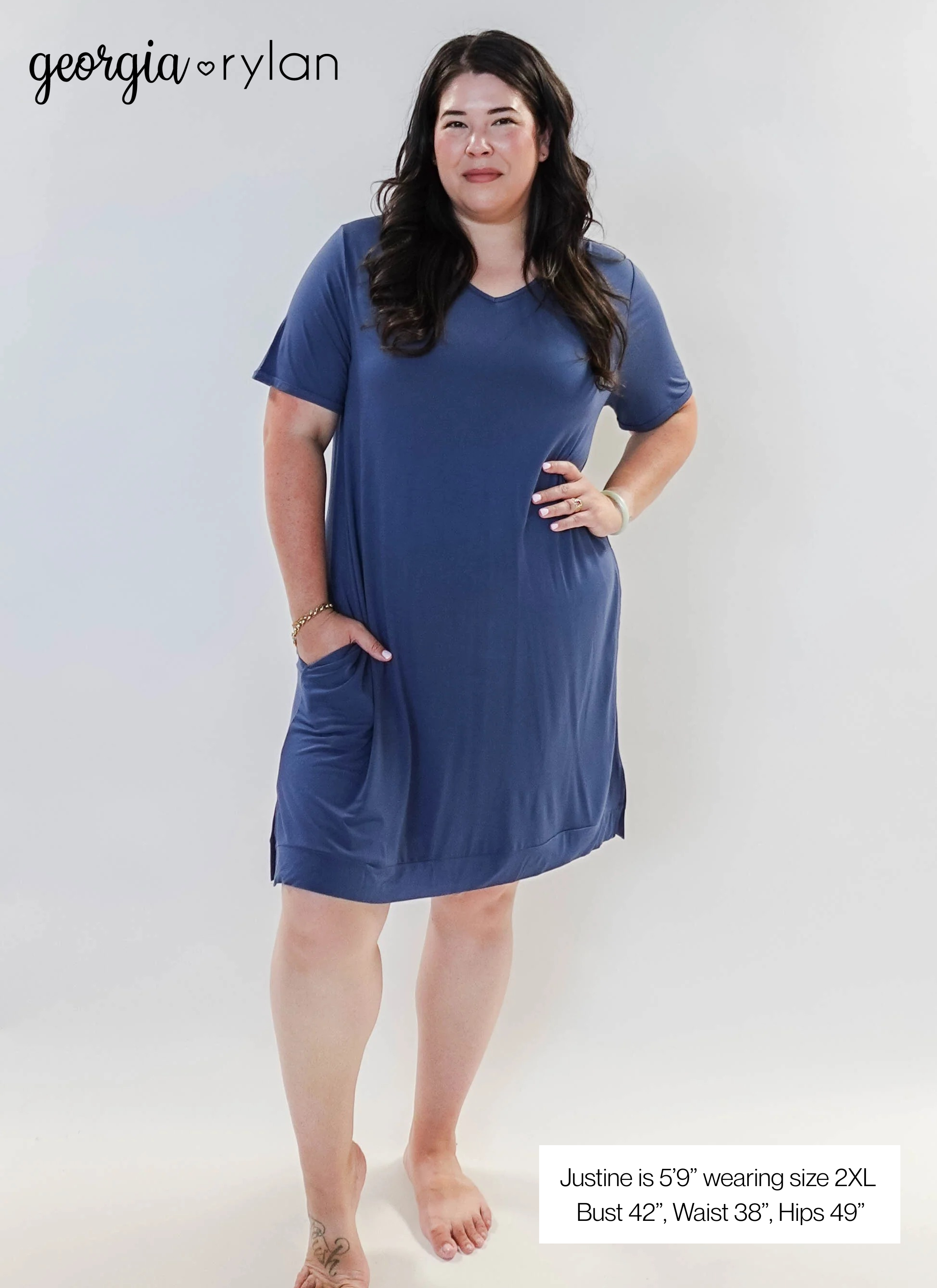 Stylish model wearing Denim Blue V Neck Bamboo Nightshirt dress with pockets, showcasing versatility in sleepwear and everyday fashion.