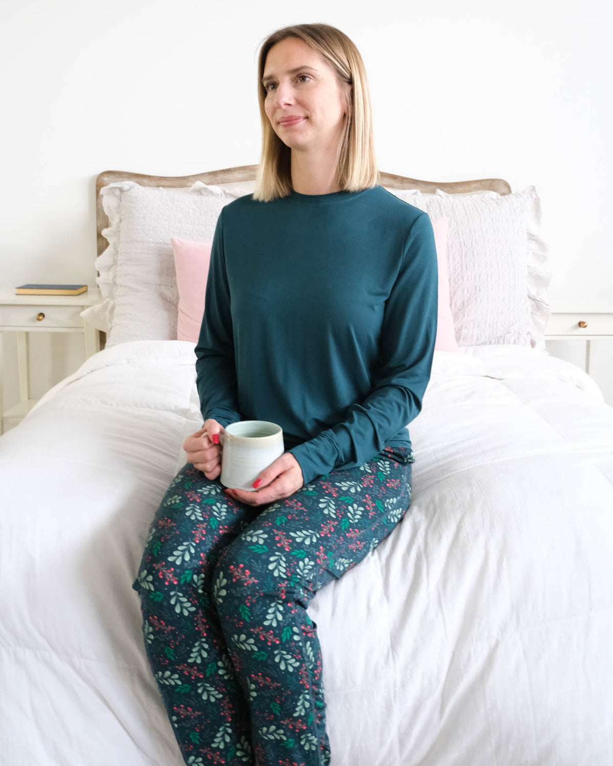 Georgia Rylan Teal Evergreen Dreams Bamboo Jogger PJ Set lifestyle seated front view — Cloud Nine Pajamas Edmonton