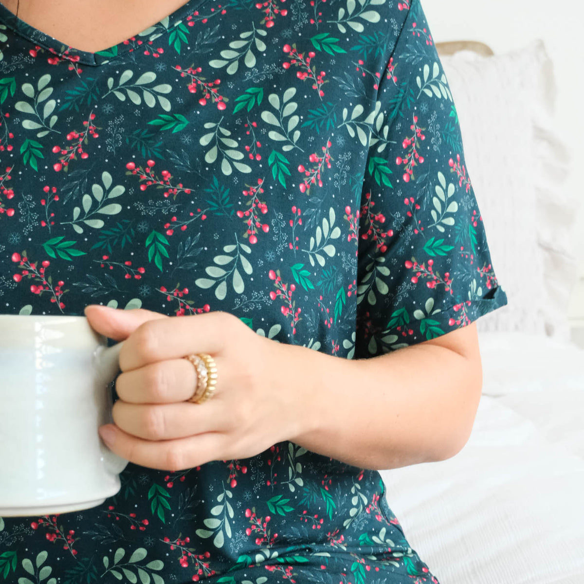 Georgia Rylan Evergreen Dreams V-Neck Bamboo Nightshirt lifestyle front view close up of green mistletoe holiday print — Cloud Nine Pajamas Edmonton